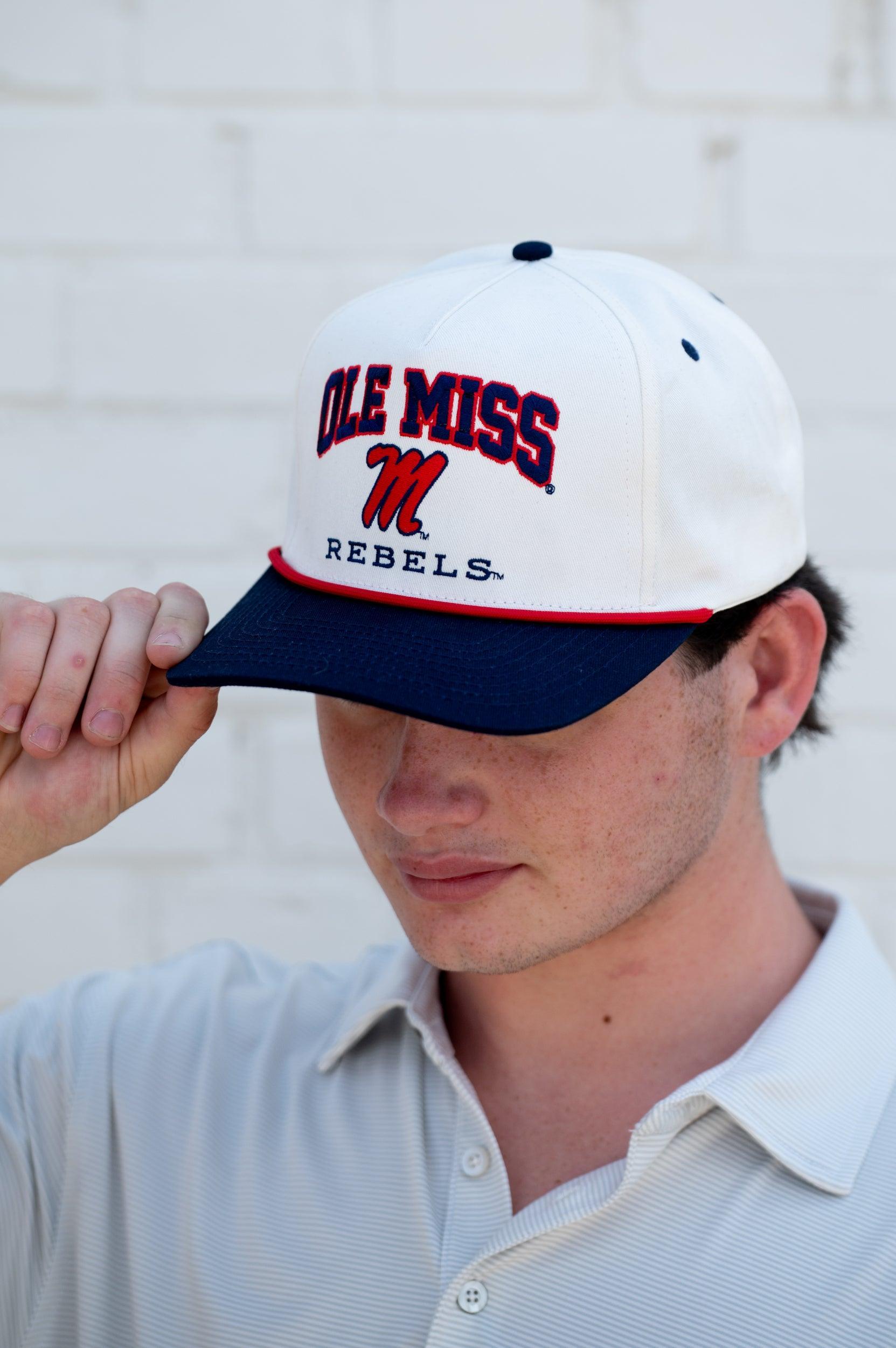 Ole Miss Cream and Navy Hat with embroidered text “Ole Miss Rebels” surrounding the Script M Logo