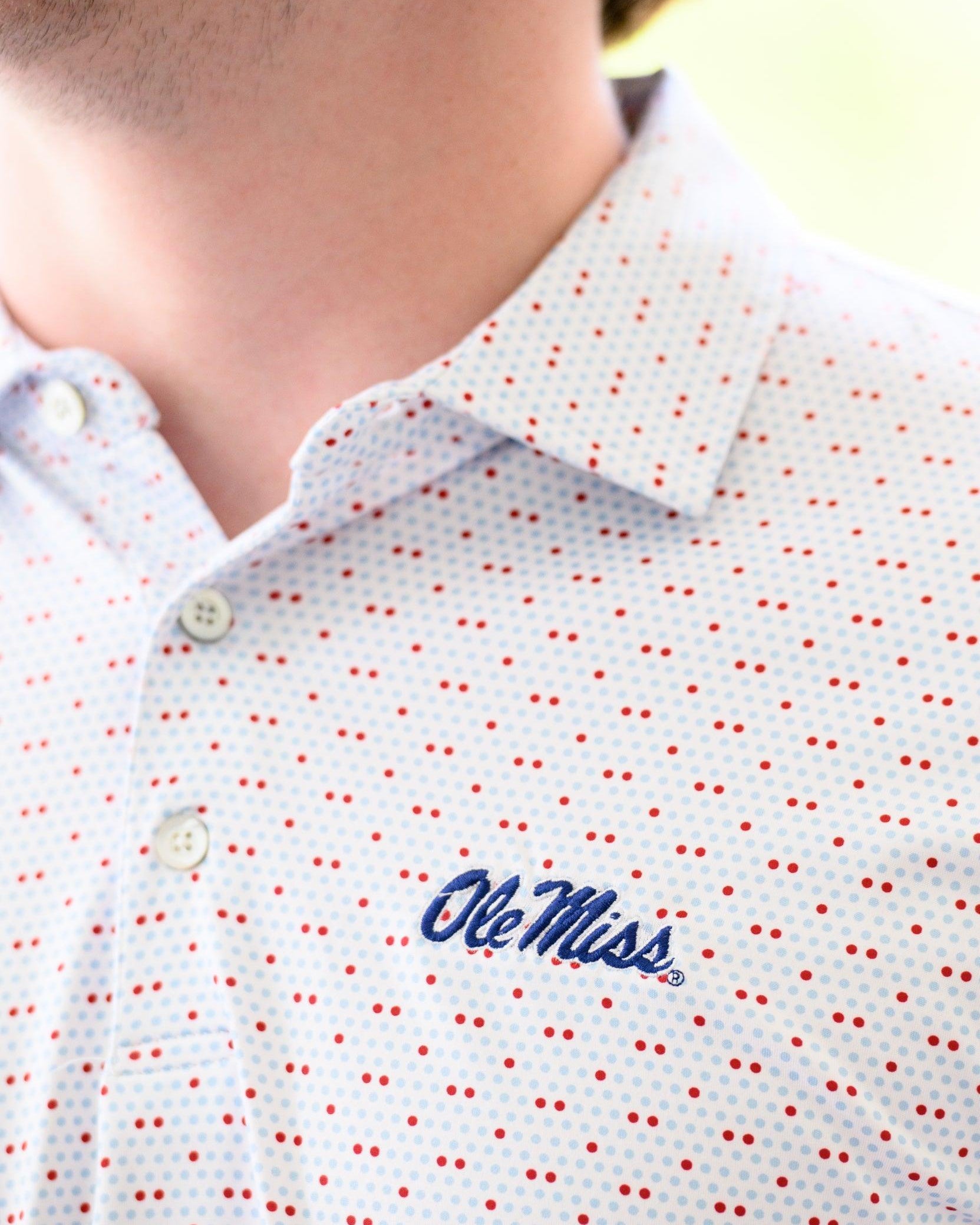 Ole Miss White Men’s Polo with Red and Light Blue dots and Navy Ole Miss Logo embroidery