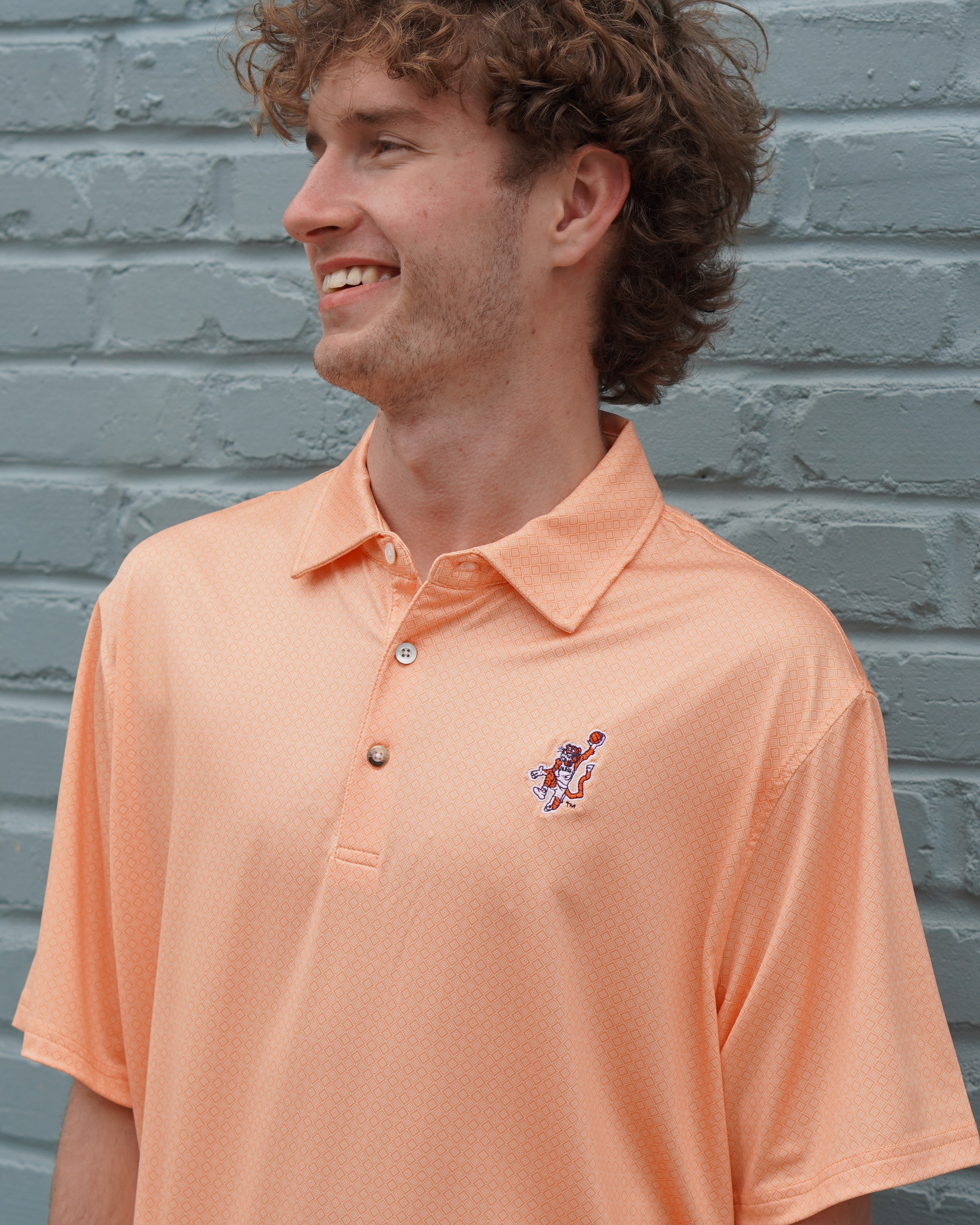 Auburn University Orange Men’s Diamond Polo with the Original Aubie basketball logo embroidery