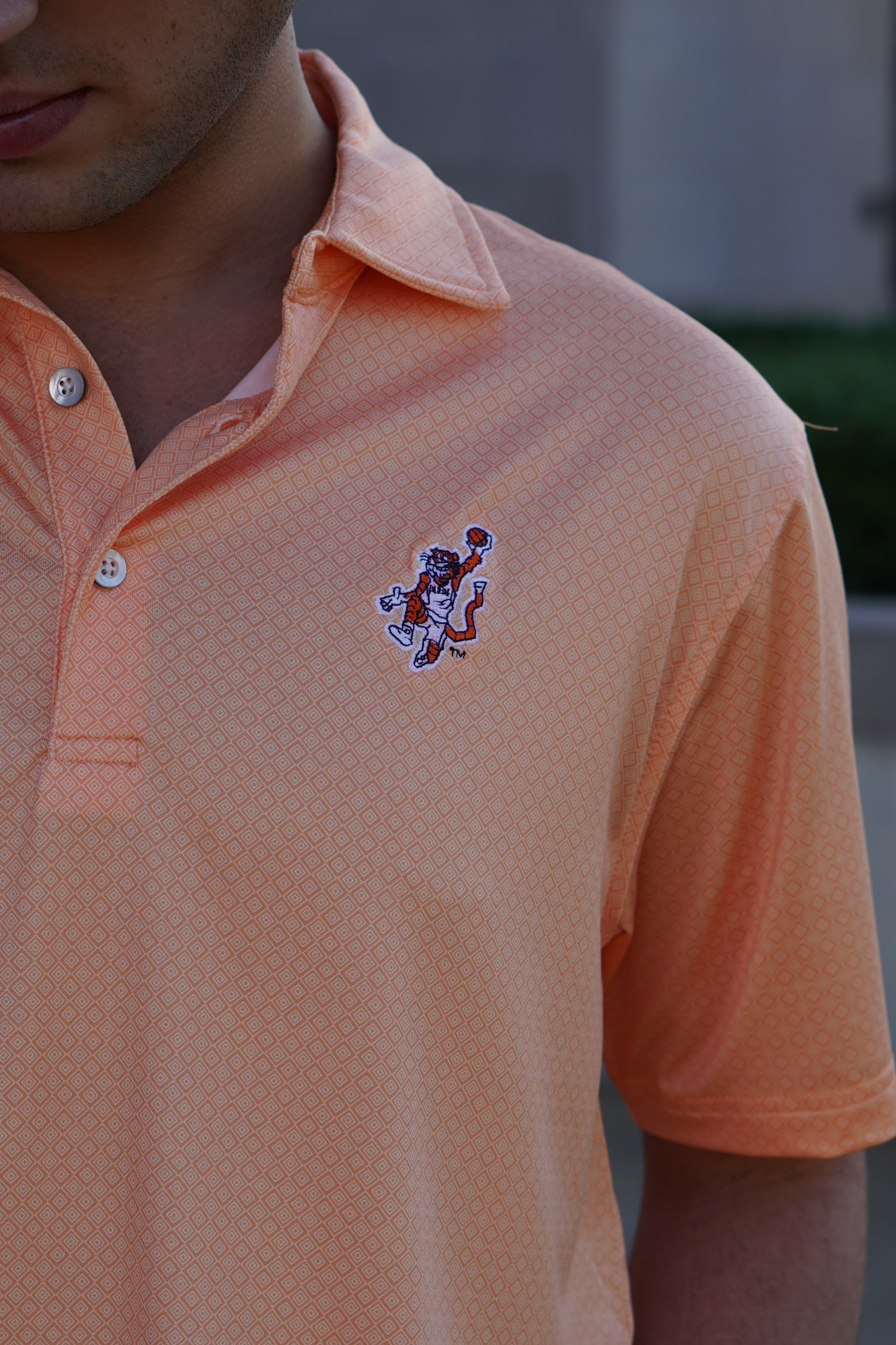 Auburn University Orange Men’s Diamond Polo with the Original Aubie Basketball Logo embroidery