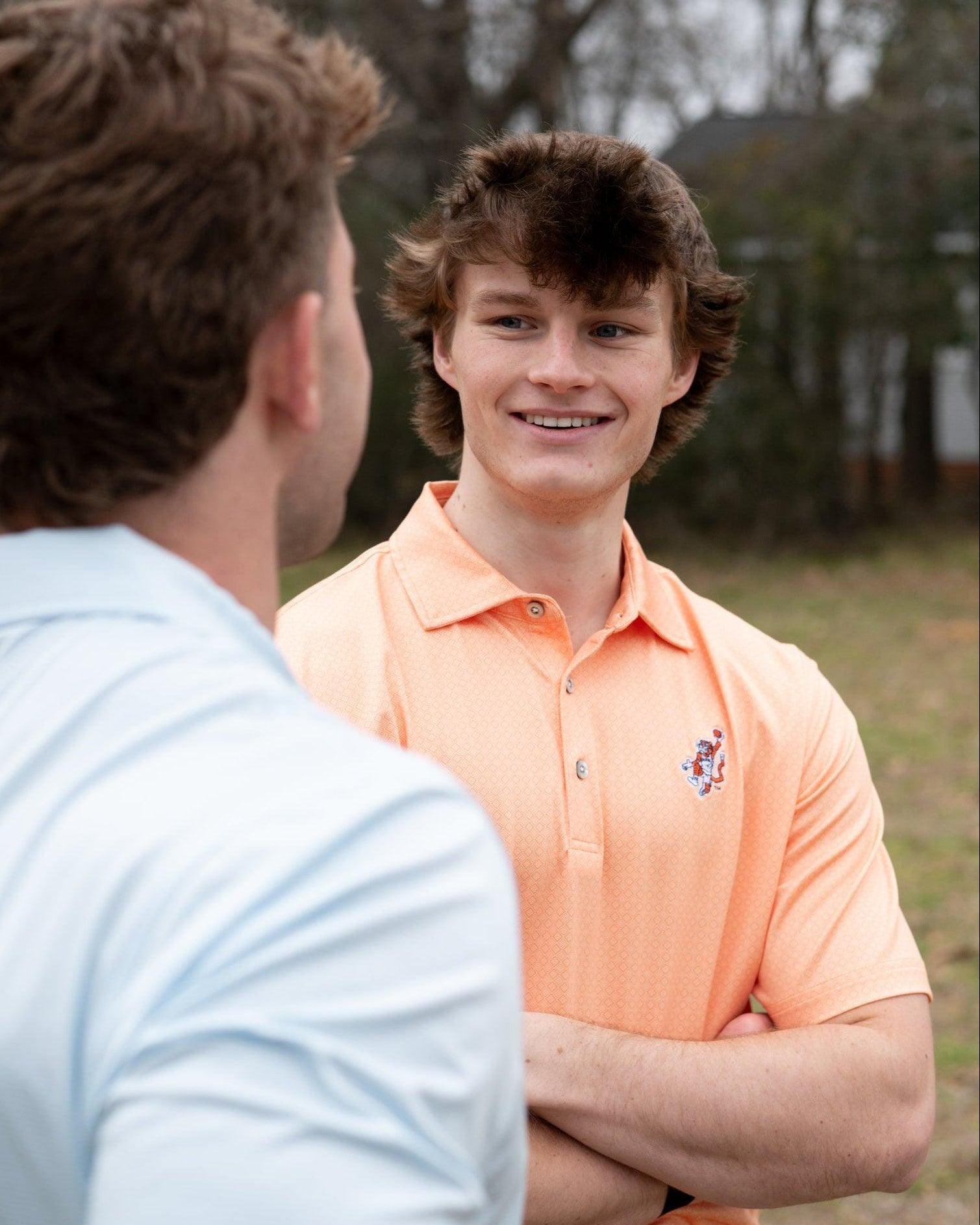 Auburn University Orange Men’s Diamond Polo with the Original Aubie Basketball Logo embroidery