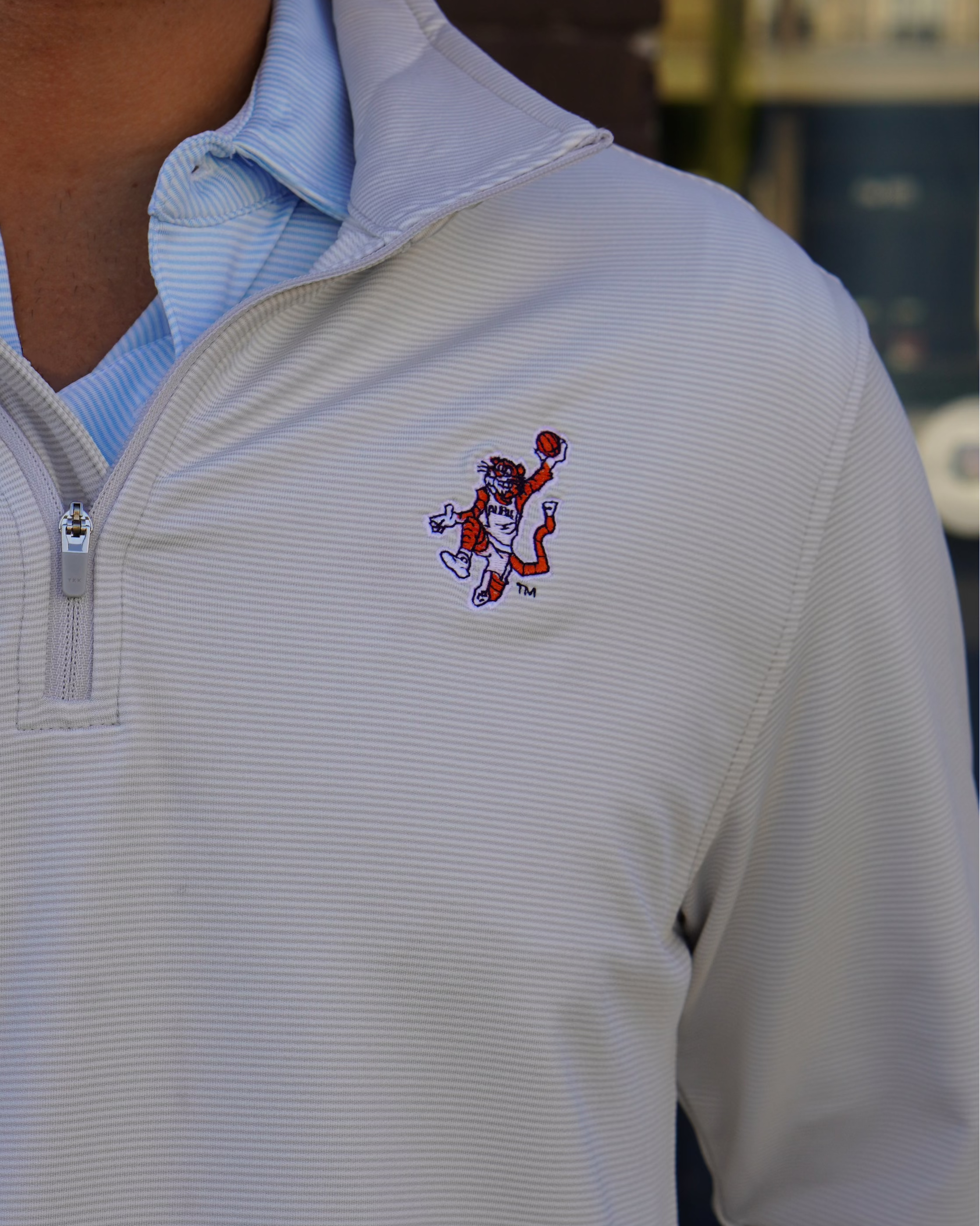 Auburn University Light Grey Stripe Men’s ¼ Zip Pullover with the Original Aubie basketball logo embroidery