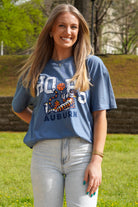 Auburn University Blue T-Shirt with the Original Aubie lounging beneath the word "Hoops" and holding a basketball in place of the second "O"