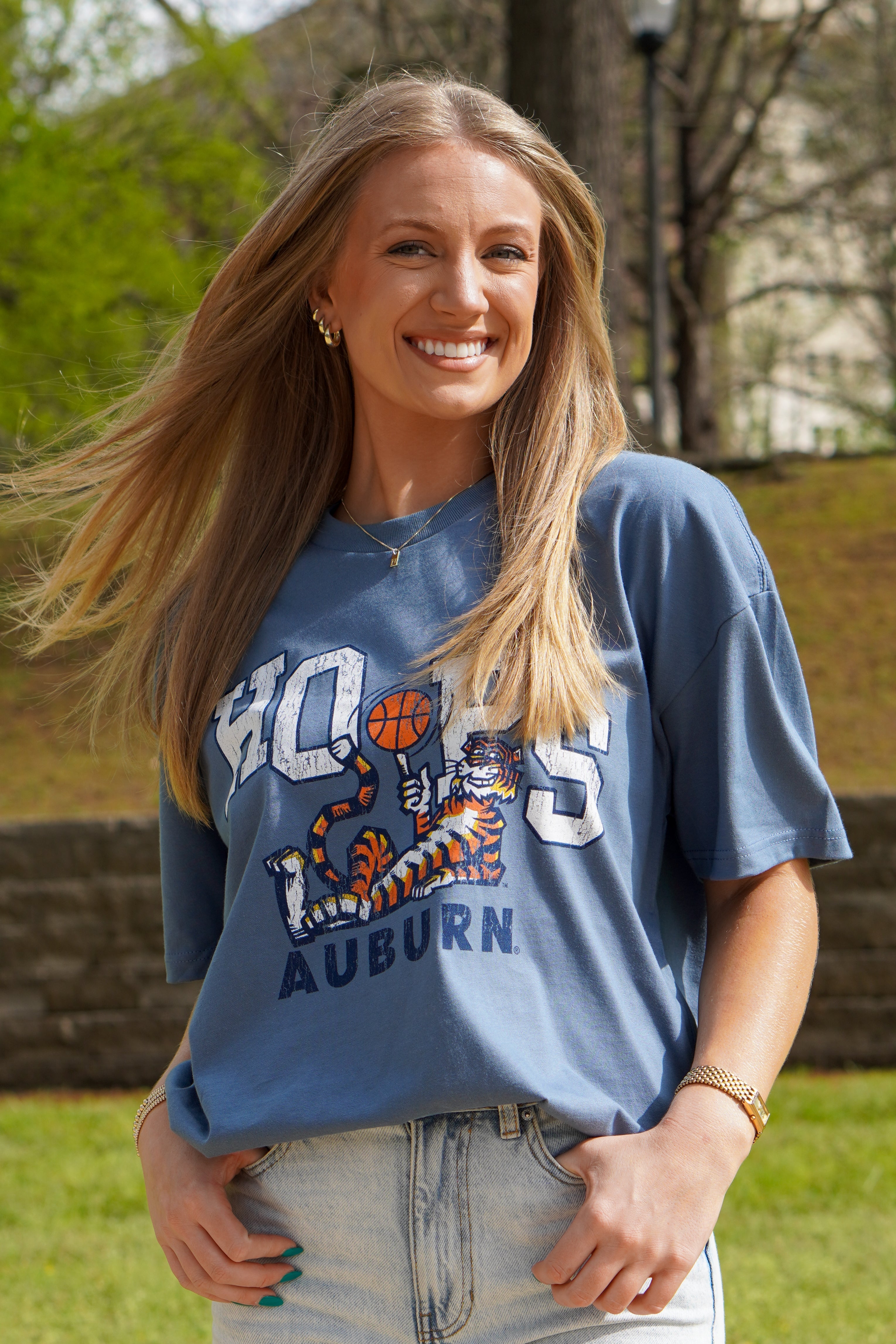Auburn University Blue T-Shirt with the Original Aubie lounging beneath the word "Hoops" and holding a basketball in place of the second "O"