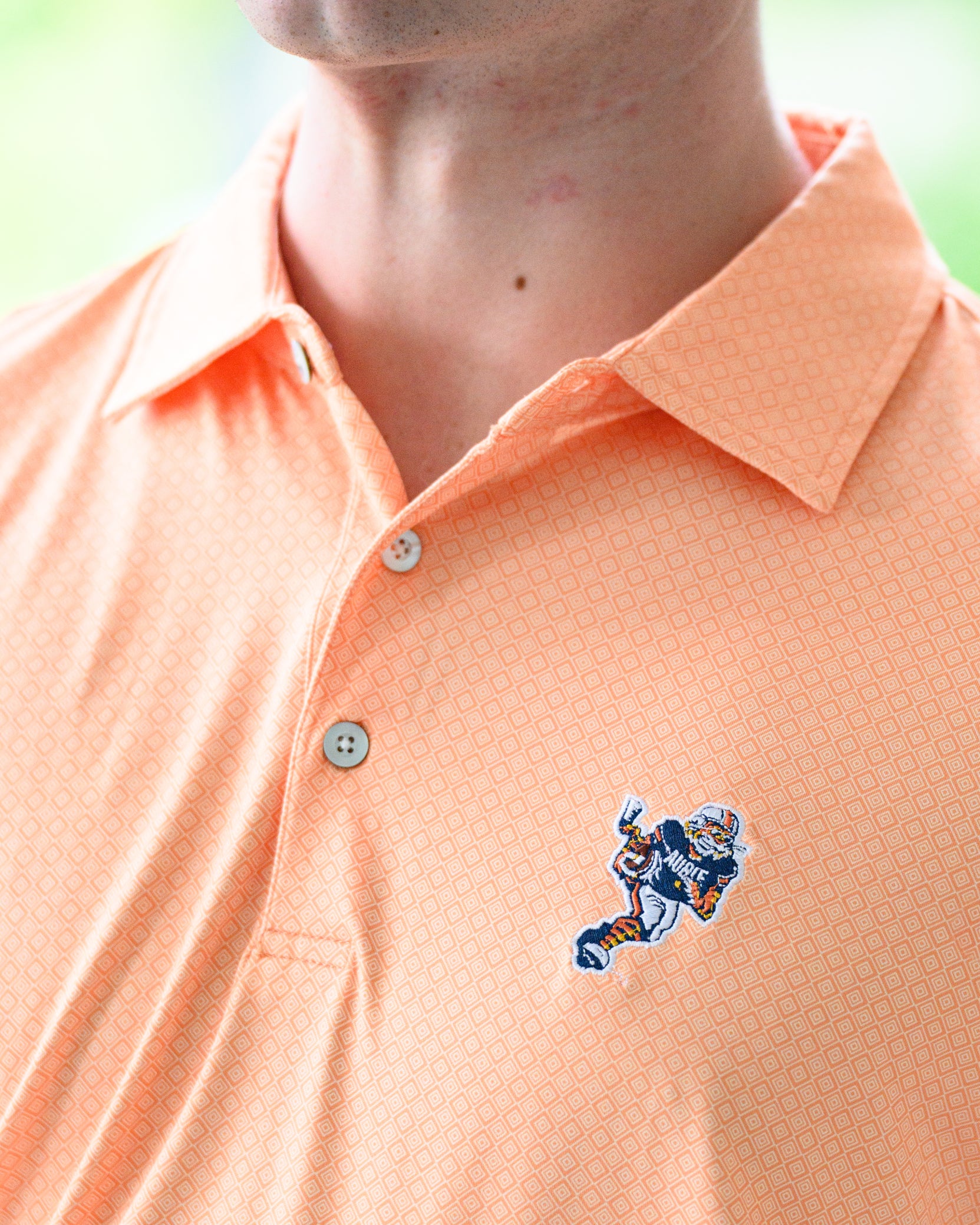 Auburn University Orange Men’s Diamond Polo with the Original Aubie Football Logo embroidery