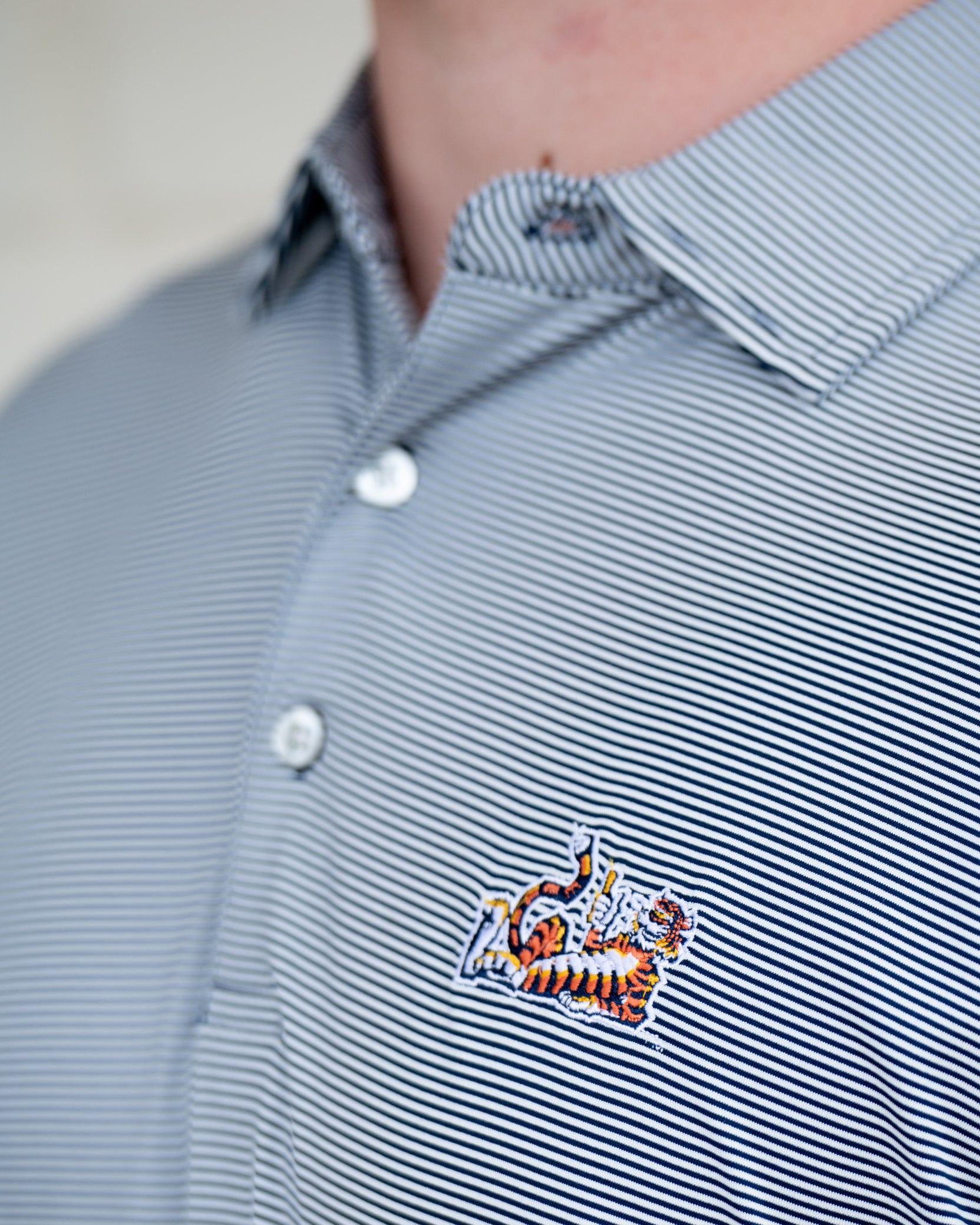 Auburn University Navy Men’s Stripe Polo with the Original Aubie Logo embroidery