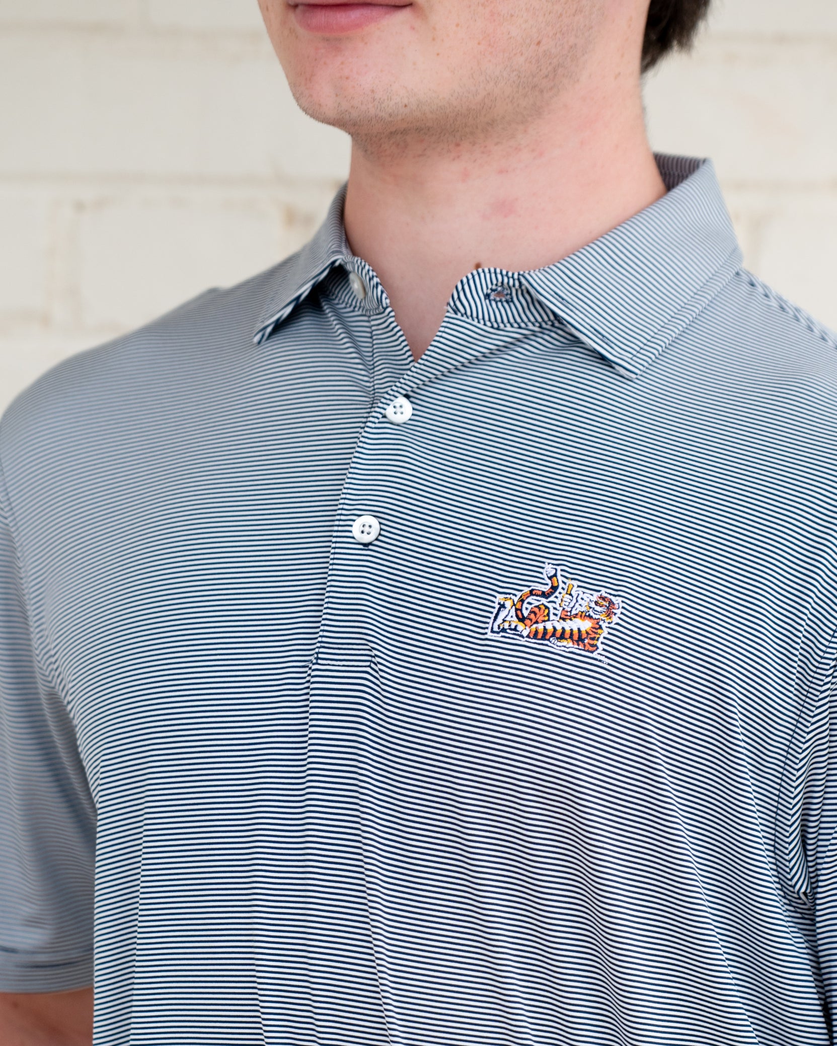 Auburn University Navy Men’s Stripe Polo with the Original Aubie Logo embroidery