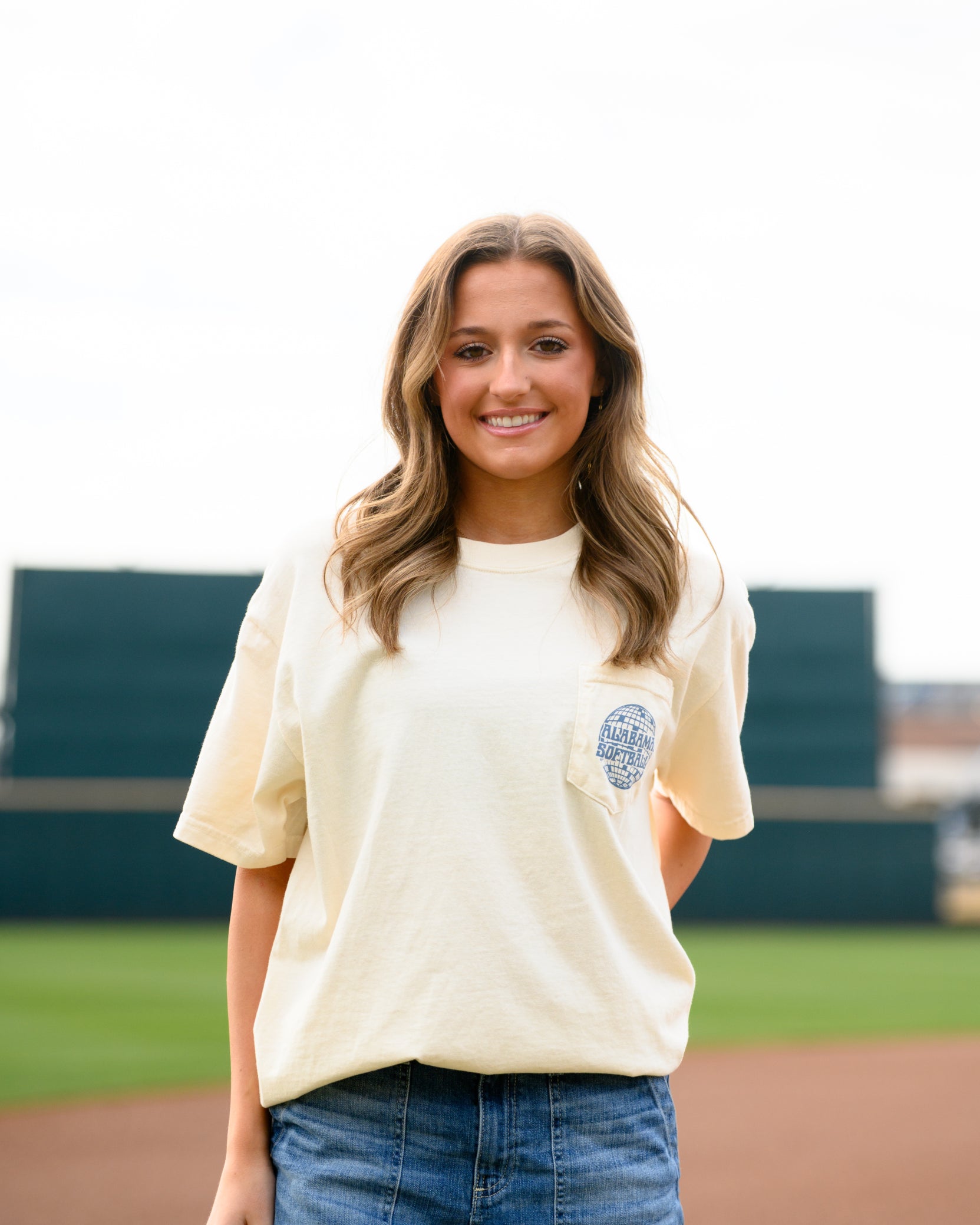 University of Alabama Ivory Front Pocket Design with a disco ball and text “Alabama Softball”
