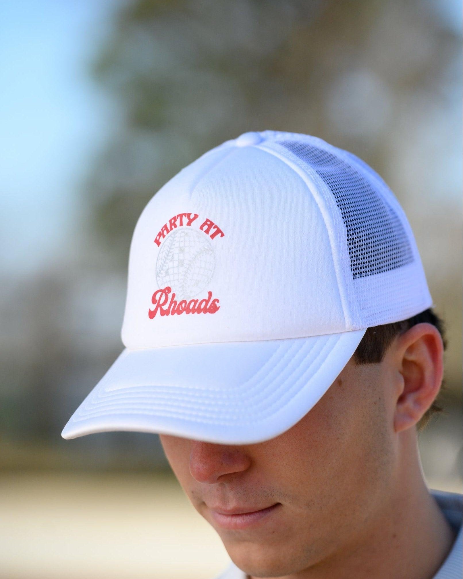 University of Alabama White Trucker Hat with Red “Party At Rhoads” text and a disco softball design in silver.