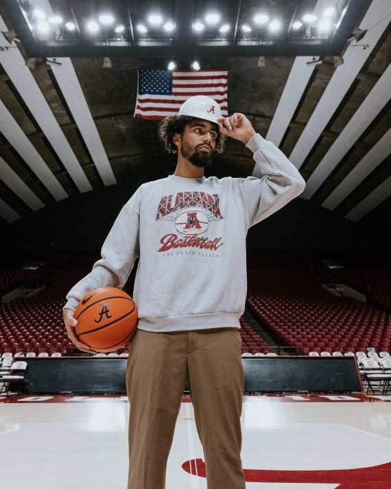 University of Alabama Heather Grey Sweatshirt with Plaid text “Alabama” above a Vintage A Logo Basketball and Red text “Basketball” underneath, with Black text “The Plaid Palace” across the bottom of the design