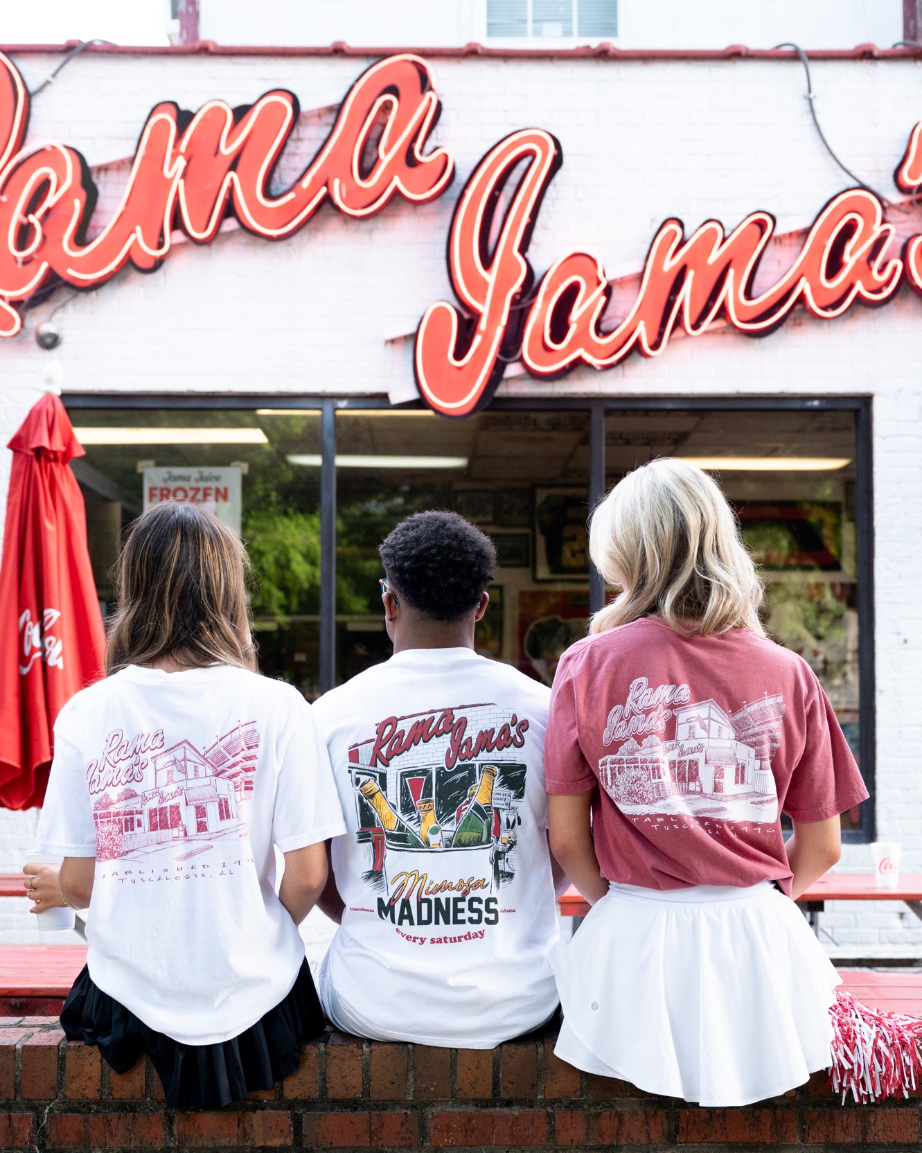 Rama Jama's White Tee with a Red illustration of the Rama Jama's Building