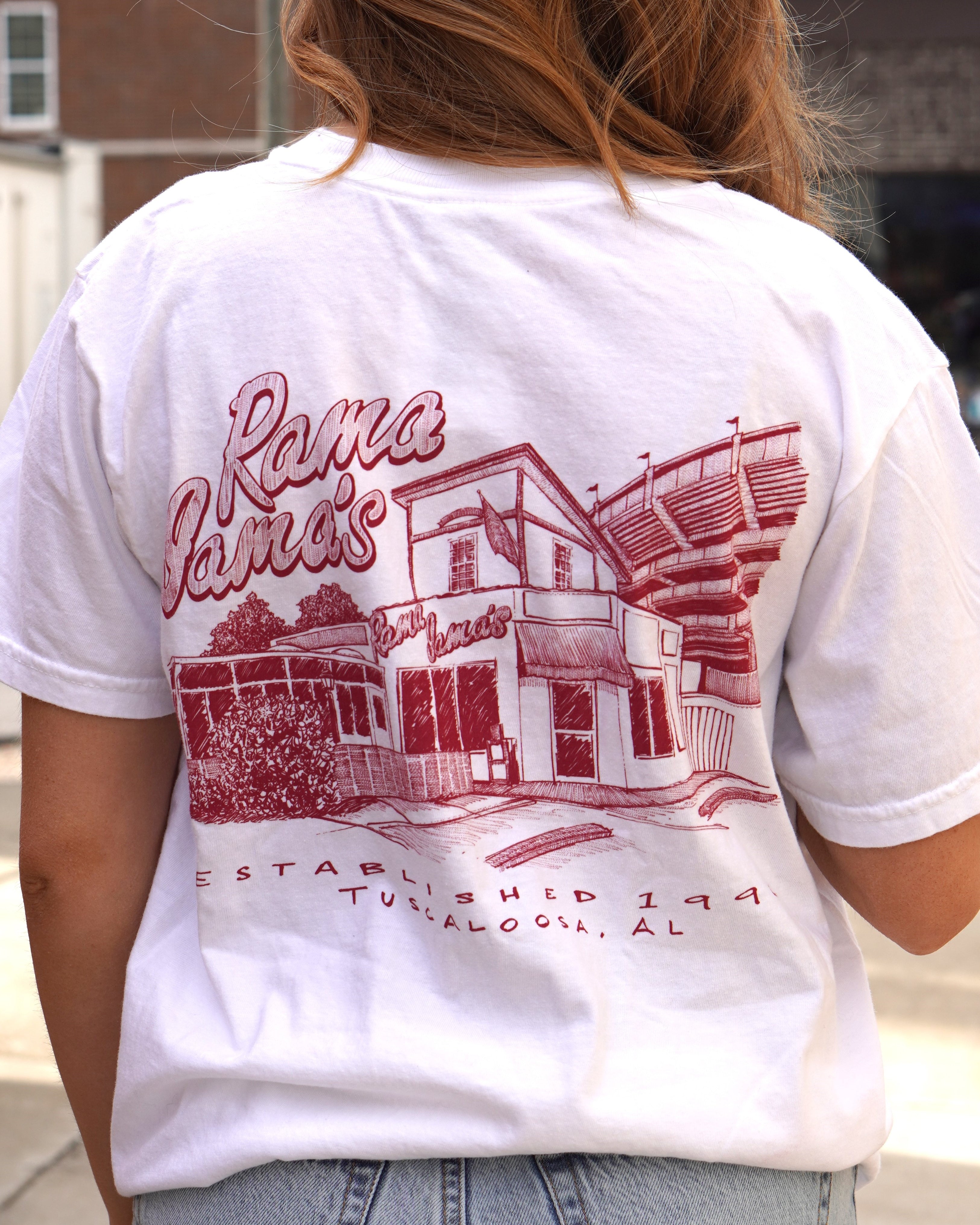 Rama Jama's White Tee with a Red illustration of the Rama Jama's Building