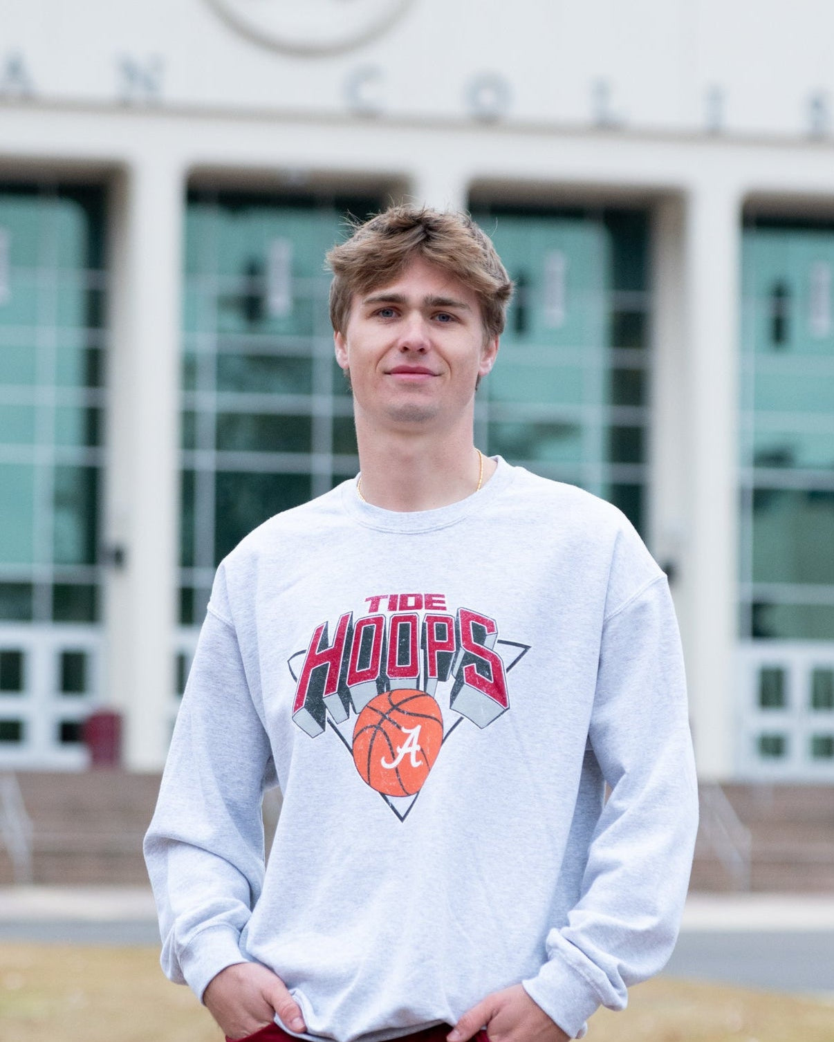 University of Alabama Light Grey Heather Sweatshirt with a Script A basketball underneath the words “Tide Hoops”