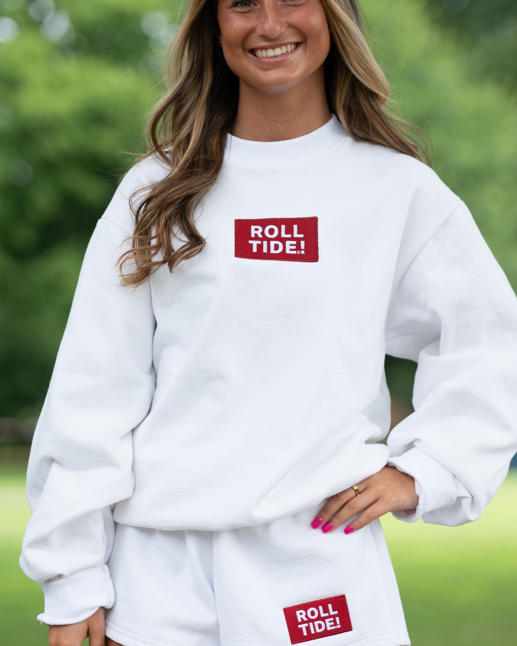 University of Alabama White Roll Tide Shorts featuring a Red and White embroidered patch with text "Roll Tide!"