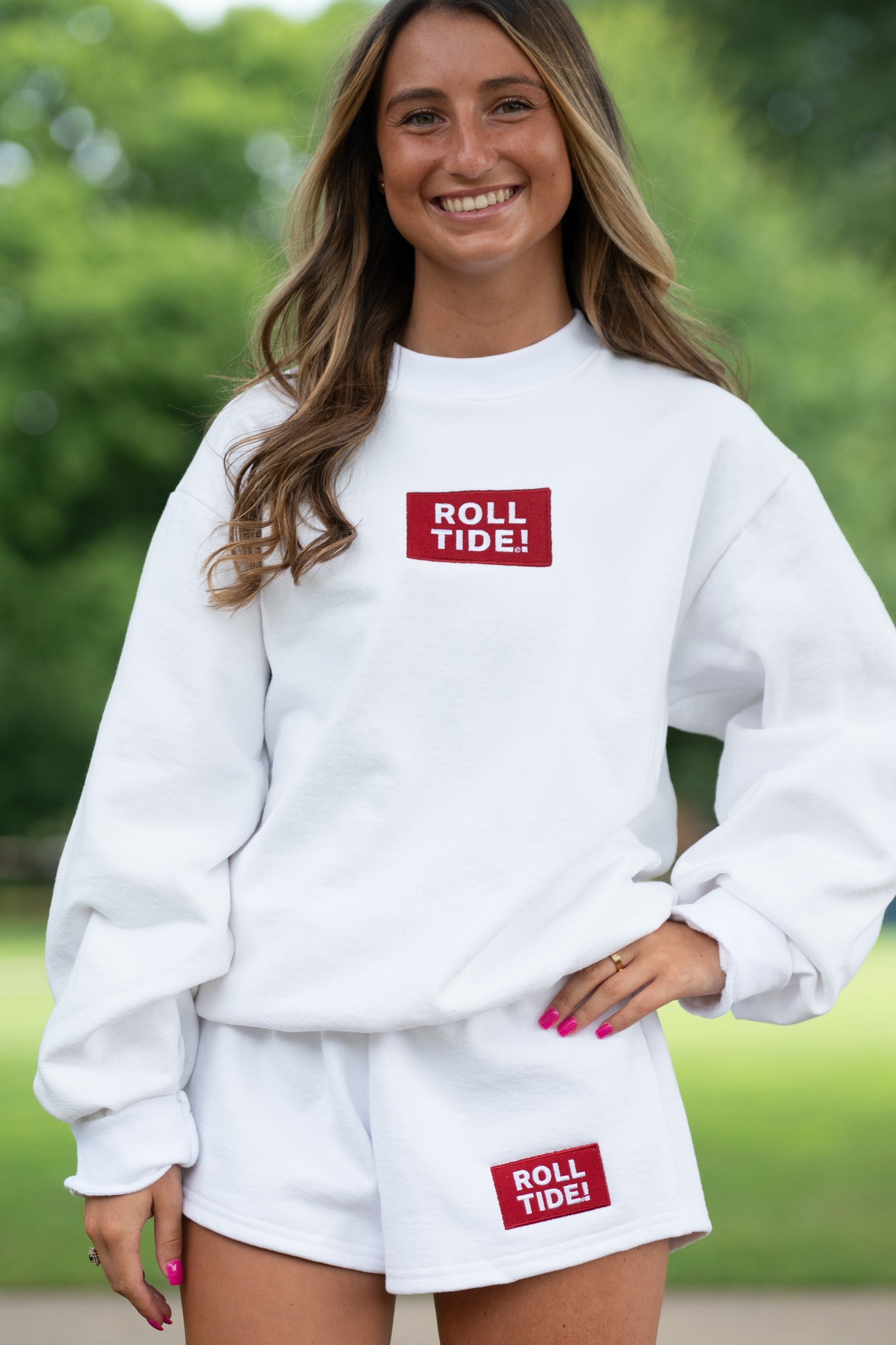 University of Alabama White Roll Tide Shorts featuring a Red and White embroidered patch with text "Roll Tide!"