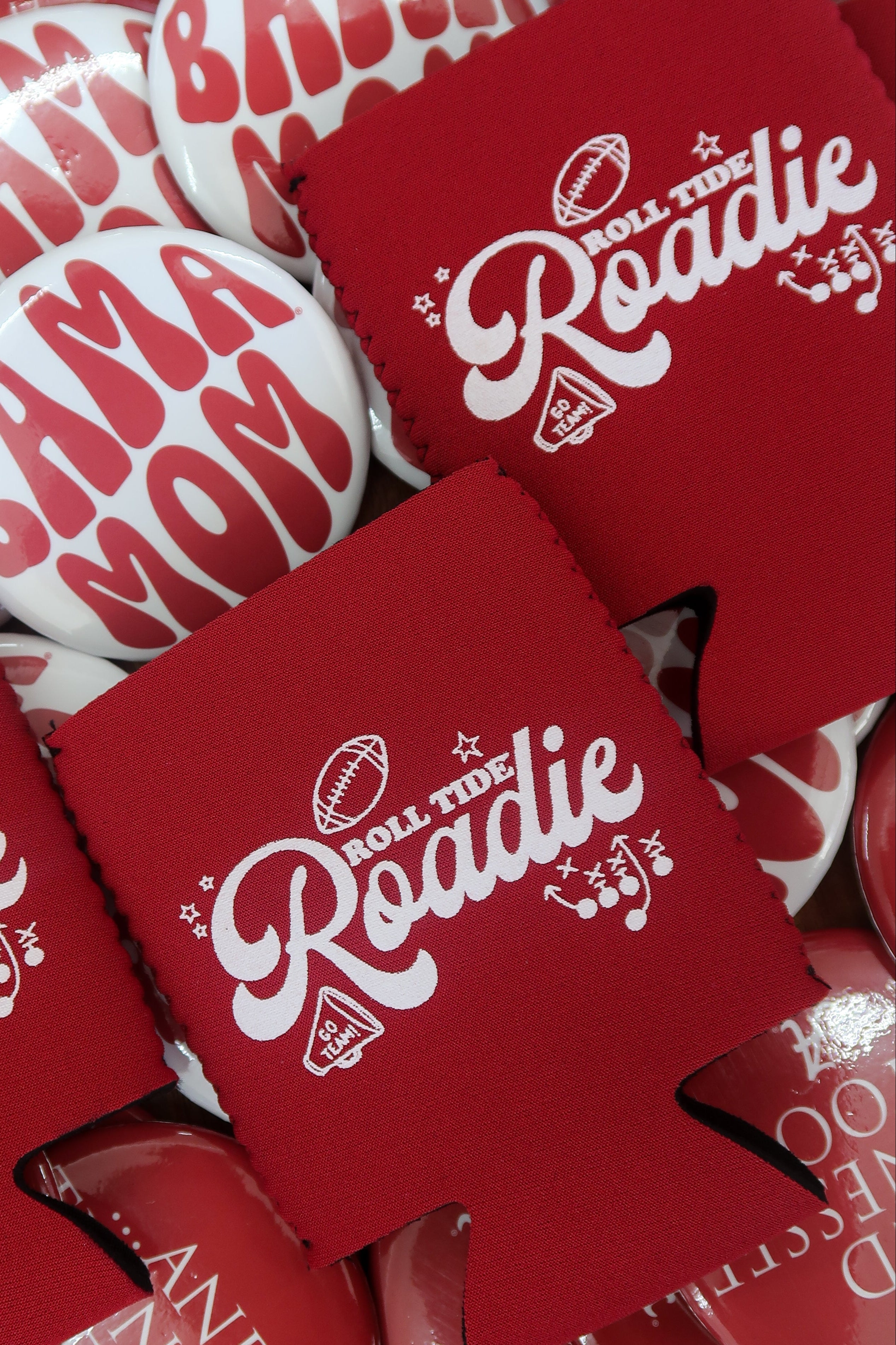 University of Alabama Red Koozie with White text “Roll Tide Roadie”