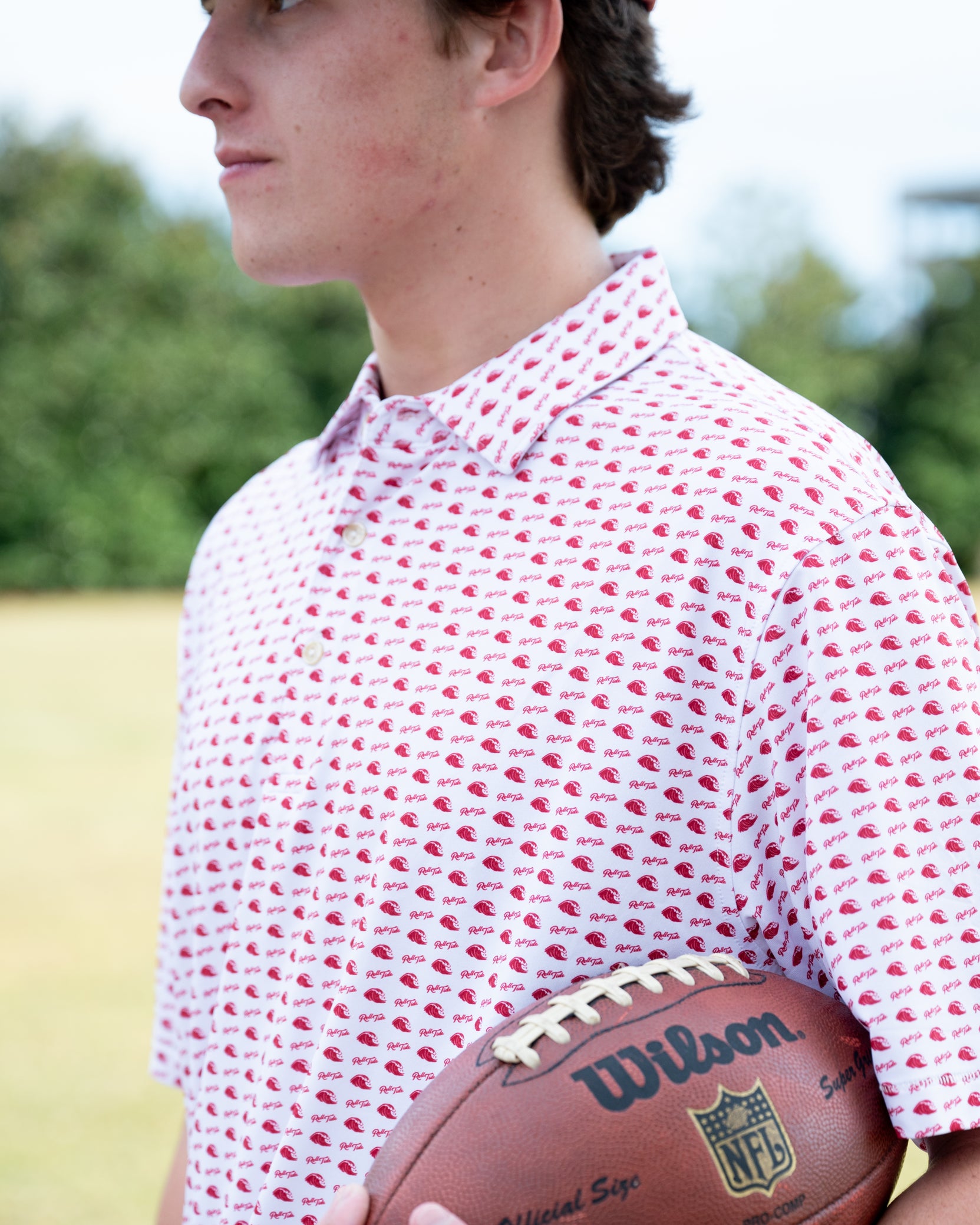 University of Alabama White Men's Polo with a Red pattern of Waves and "Roll Tide"
