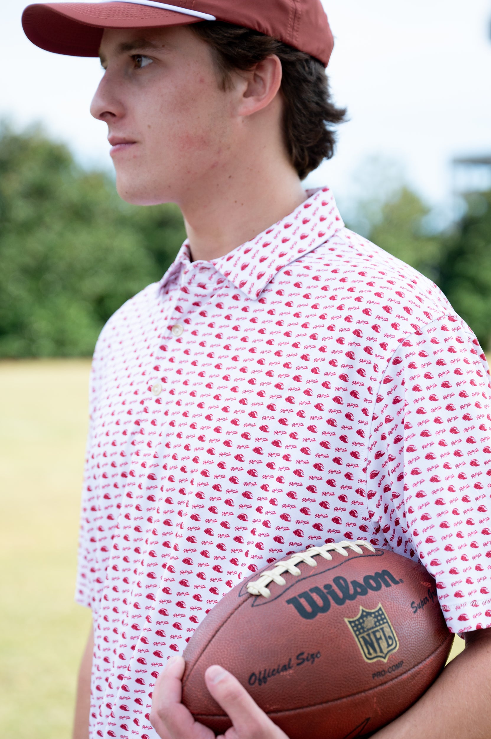 University of Alabama White Men's Polo with a Red pattern of Waves and "Roll Tide"