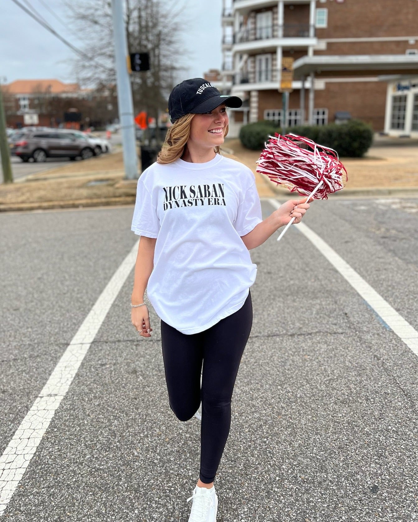 University of Alabama White Eras Tee with an Eras Tour inspired design featuring Nick Saban