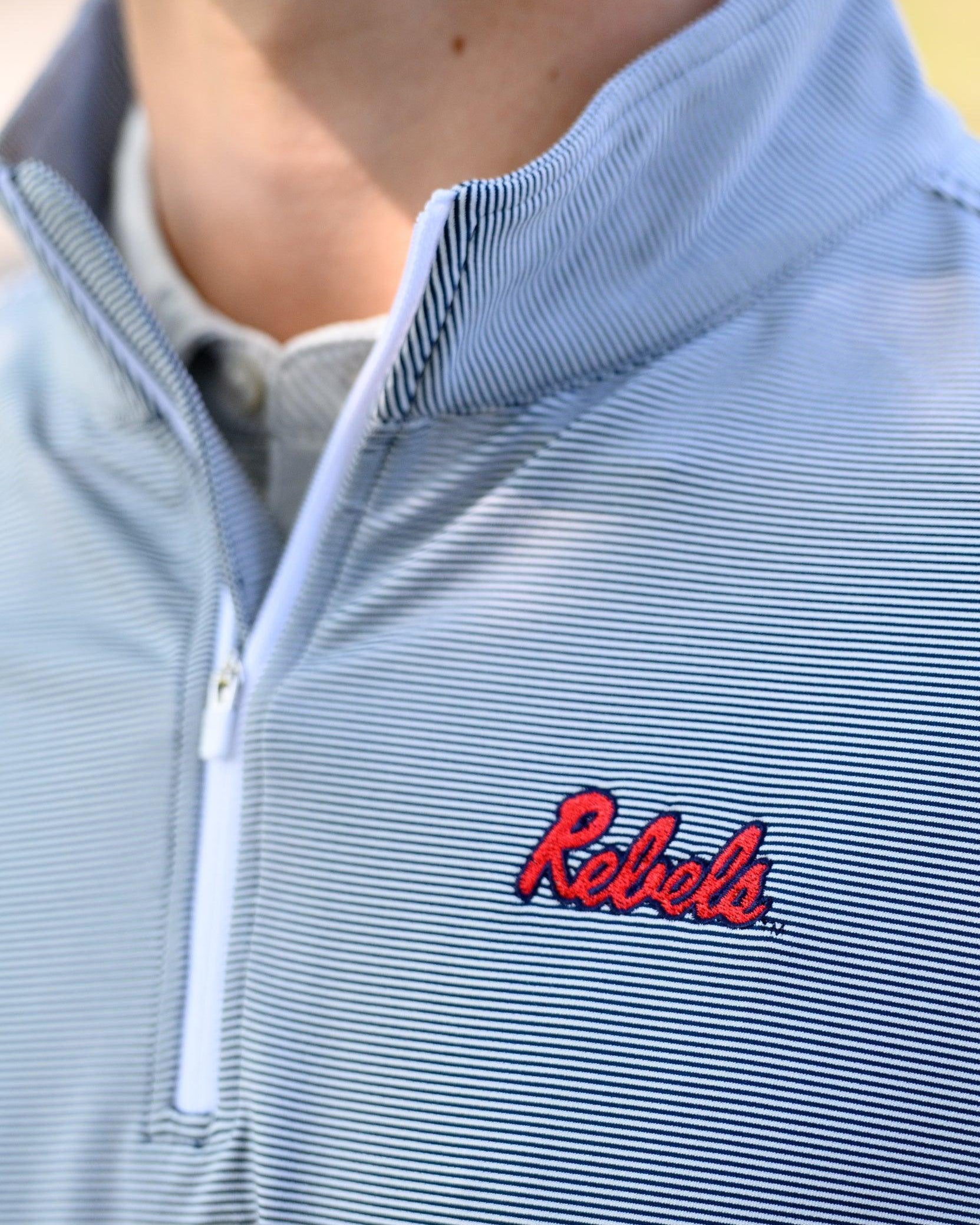 Ole Miss Navy Stripe ¼ Zip Pullover with the Script “Rebels” Logo embroidery
