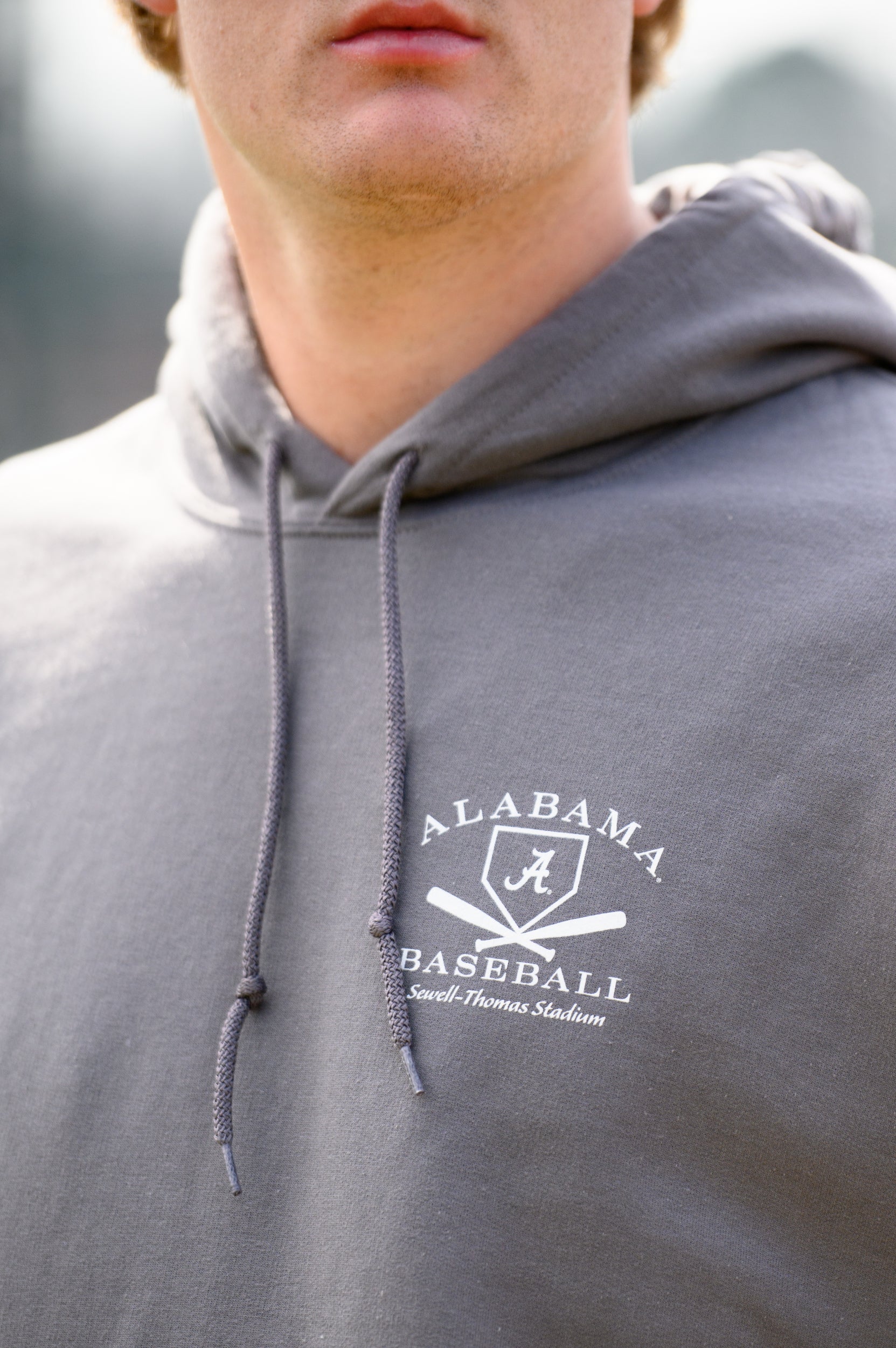 University of Alabama Light Grey Distressed Hoodie Chest Design with a white print of home plate over two crossed baseball bats