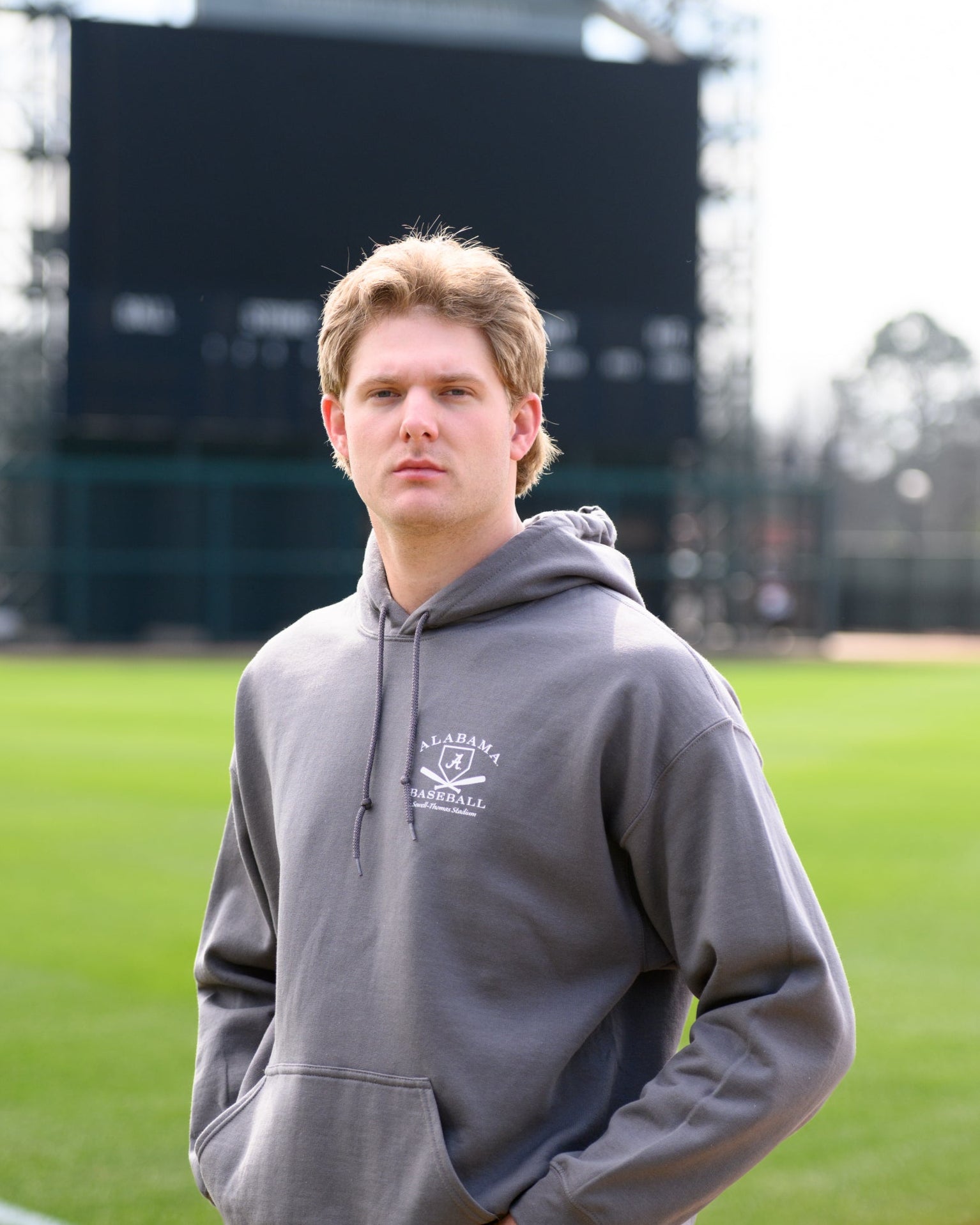 University of Alabama Light Grey Distressed Hoodie Chest Design with a white print of home plate over two crossed baseball bats