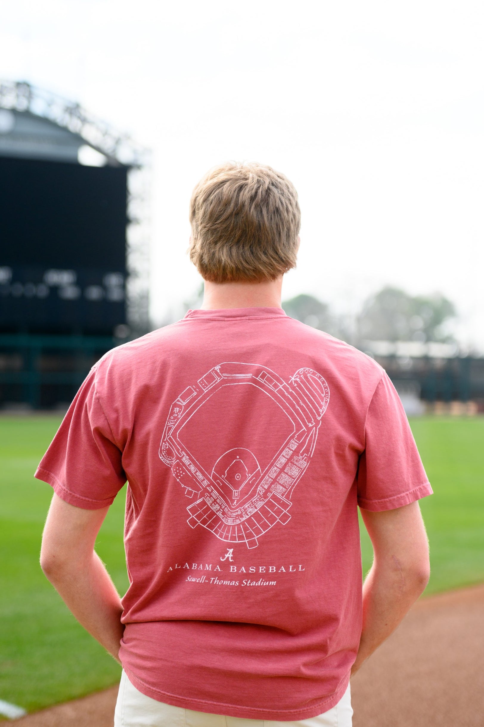 University of Alabama Red Distressed Tee with a White print of the Sewell-Thomas Stadium blueprint above text “Alabama Baseball”