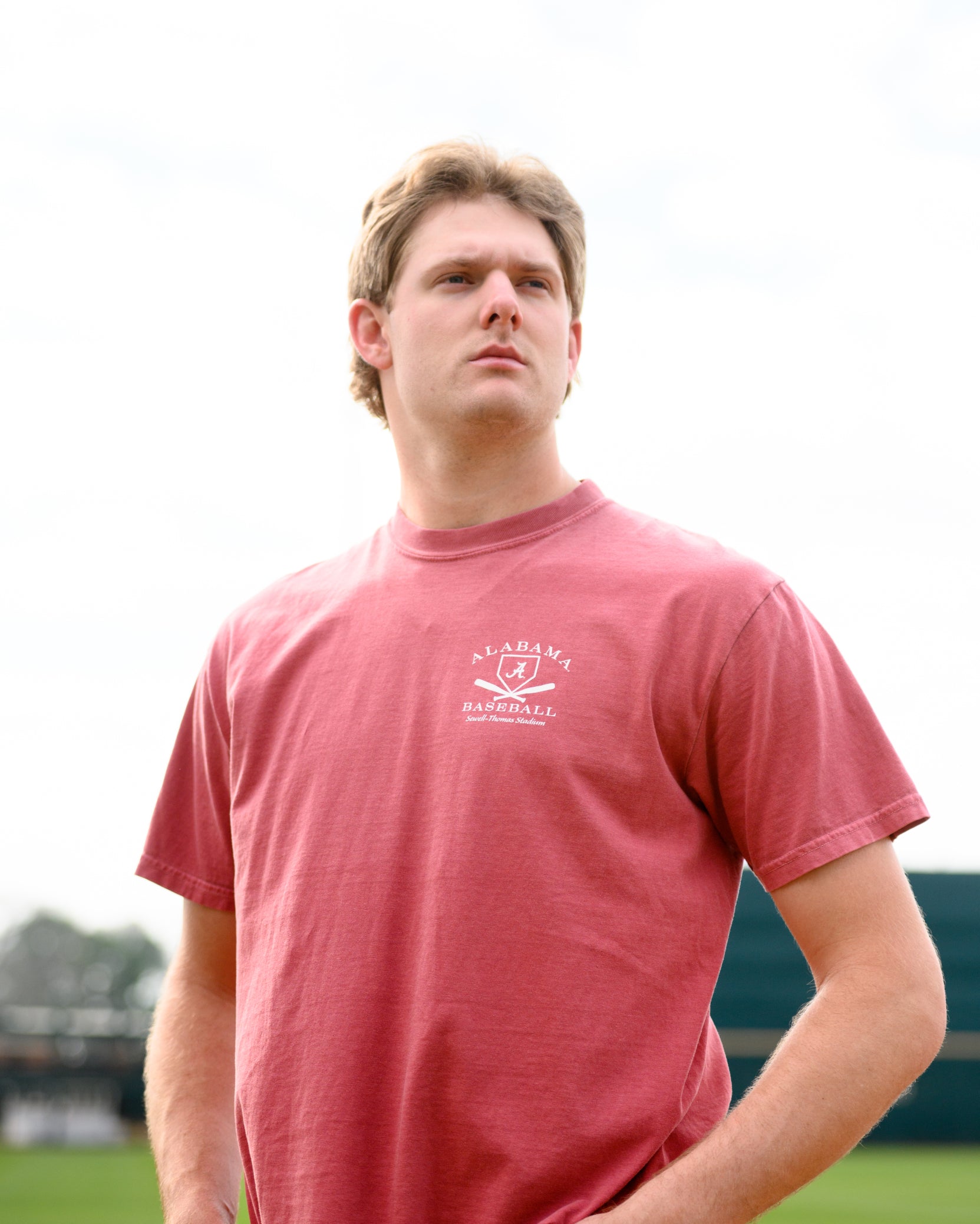 University of Alabama Red Distressed Tee Chest Design with a white print of home plate over two crossed baseball bats