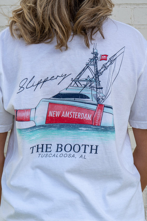 White t-shirt with a graphic of a boat and New Amsterdam branding, worn by a person.