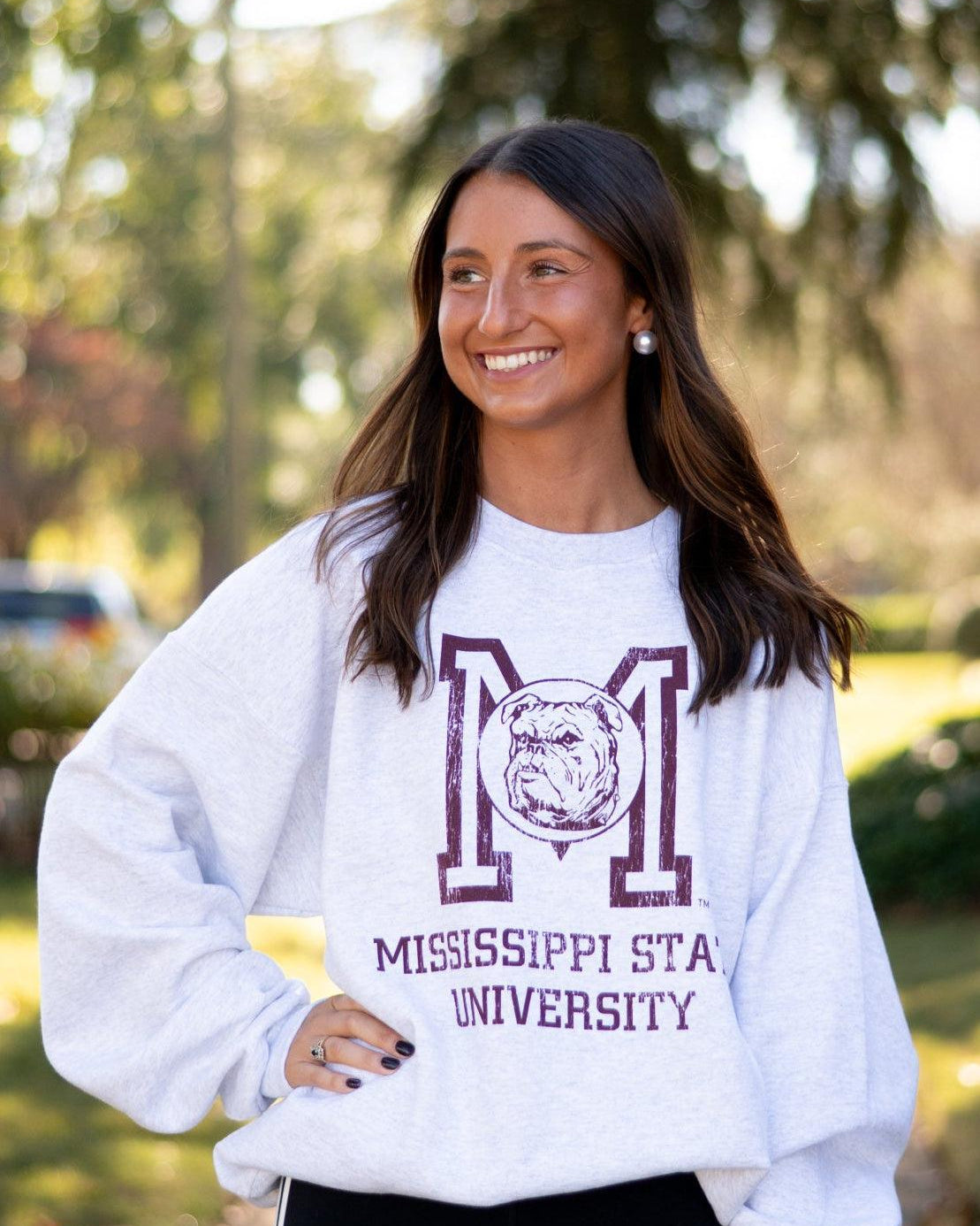 Mississippi State Light Grey Sweatshirt with the Vintage State Logo above Maroon text “Mississippi State University”