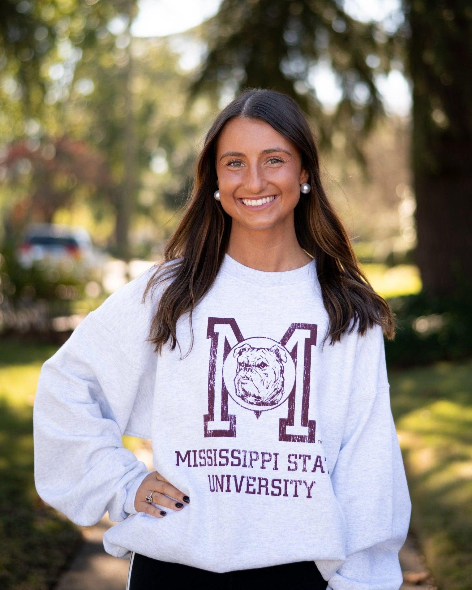 Mississippi State Light Grey Sweatshirt with the Vintage State Logo above Maroon text “Mississippi State University”