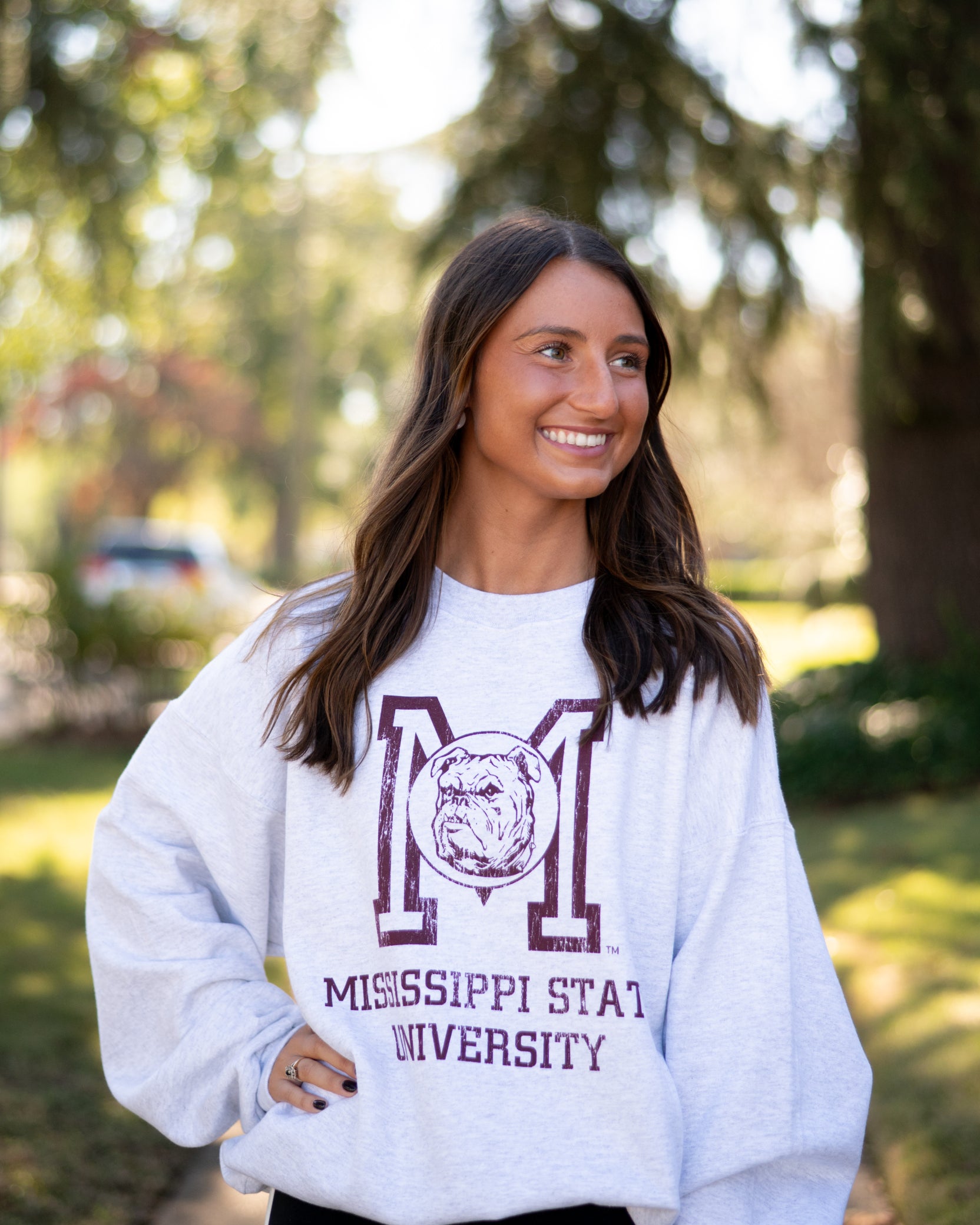 Mississippi State Light Grey Sweatshirt with the Vintage State Logo above Maroon text “Mississippi State University”