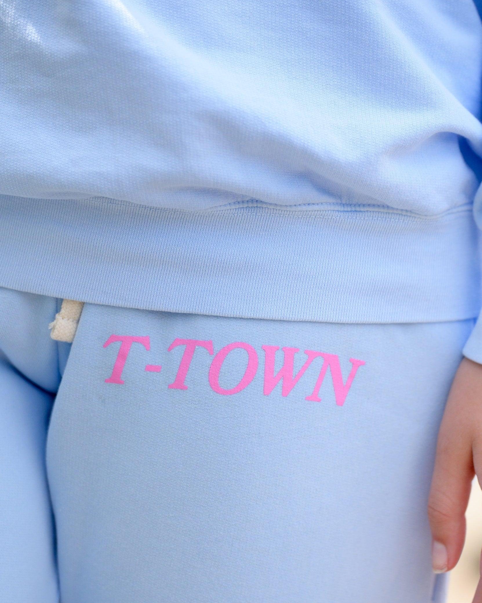 T-Town Lifestyle Sweatpants Top Left Close-Up with 'T-TOWN' text in pink