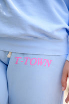 T-Town Lifestyle Sweatpants Top Left Close-Up with 'T-TOWN' text in pink