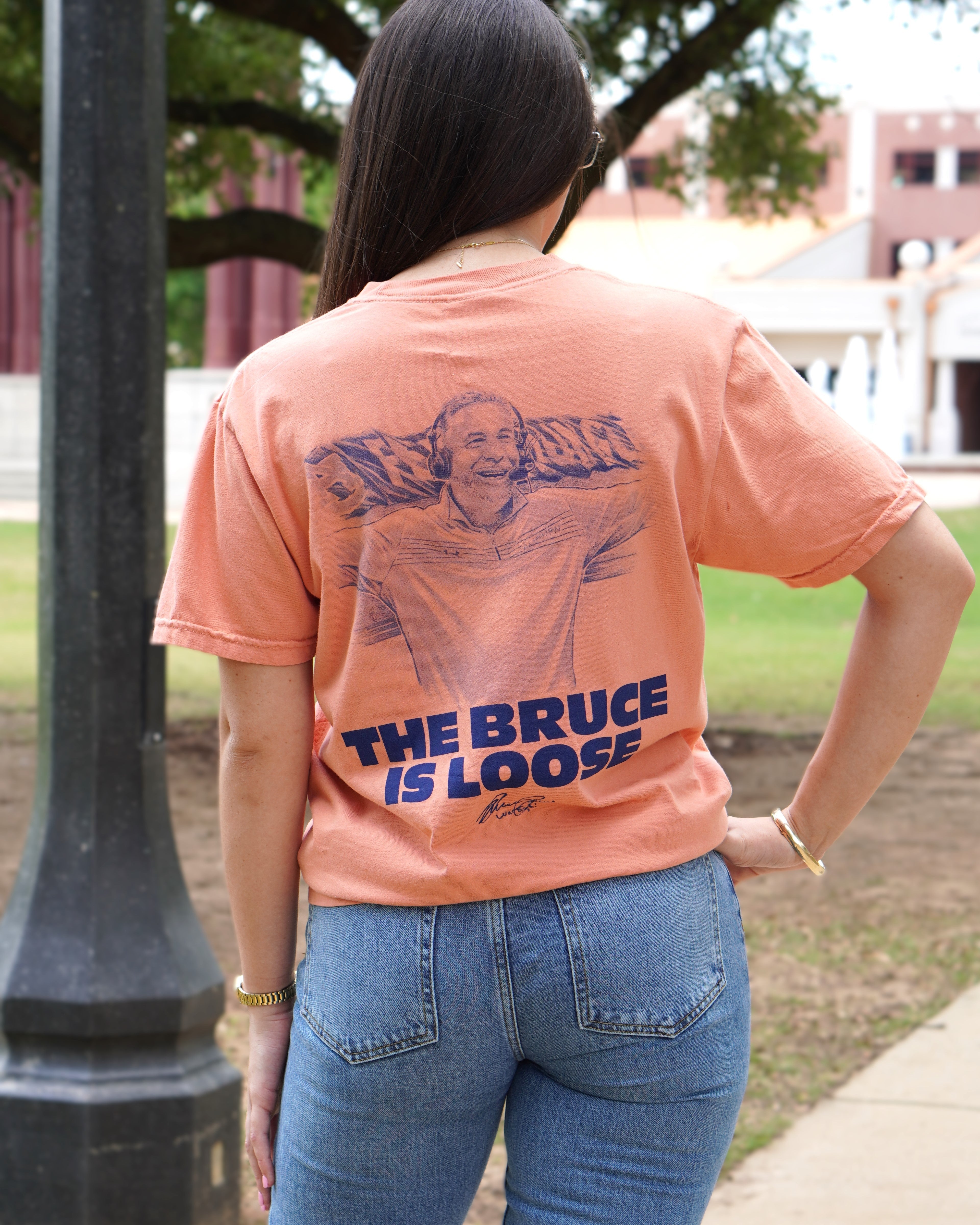 Auburn University Orange The Bruce is Loose T-Shirt featuring an illustration of the Auburn Basketball coach above text "The Bruce is Loose"