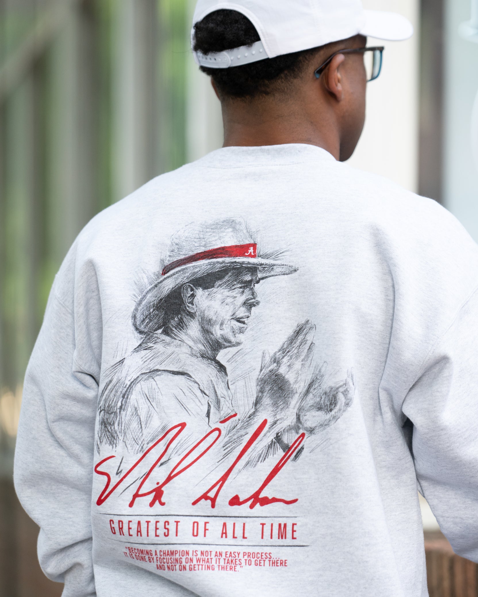 University of Alabama White Gildan Sweatshirt with an illustration of Nick Saban above his signature and Red text "Greatest Of All Time"