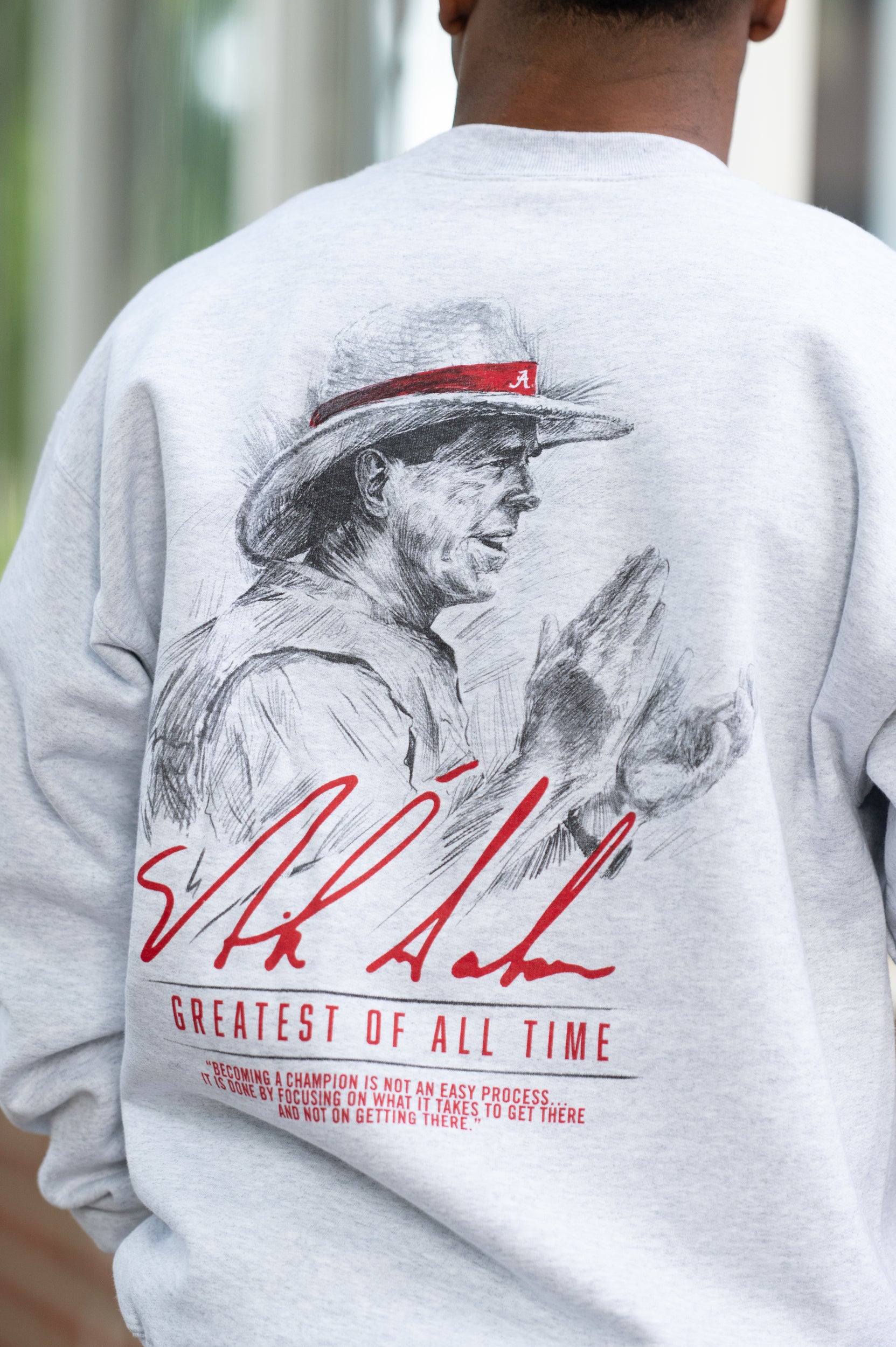 University of Alabama White Gildan Sweatshirt with an illustration of Nick Saban above his signature and Red text "Greatest Of All Time"