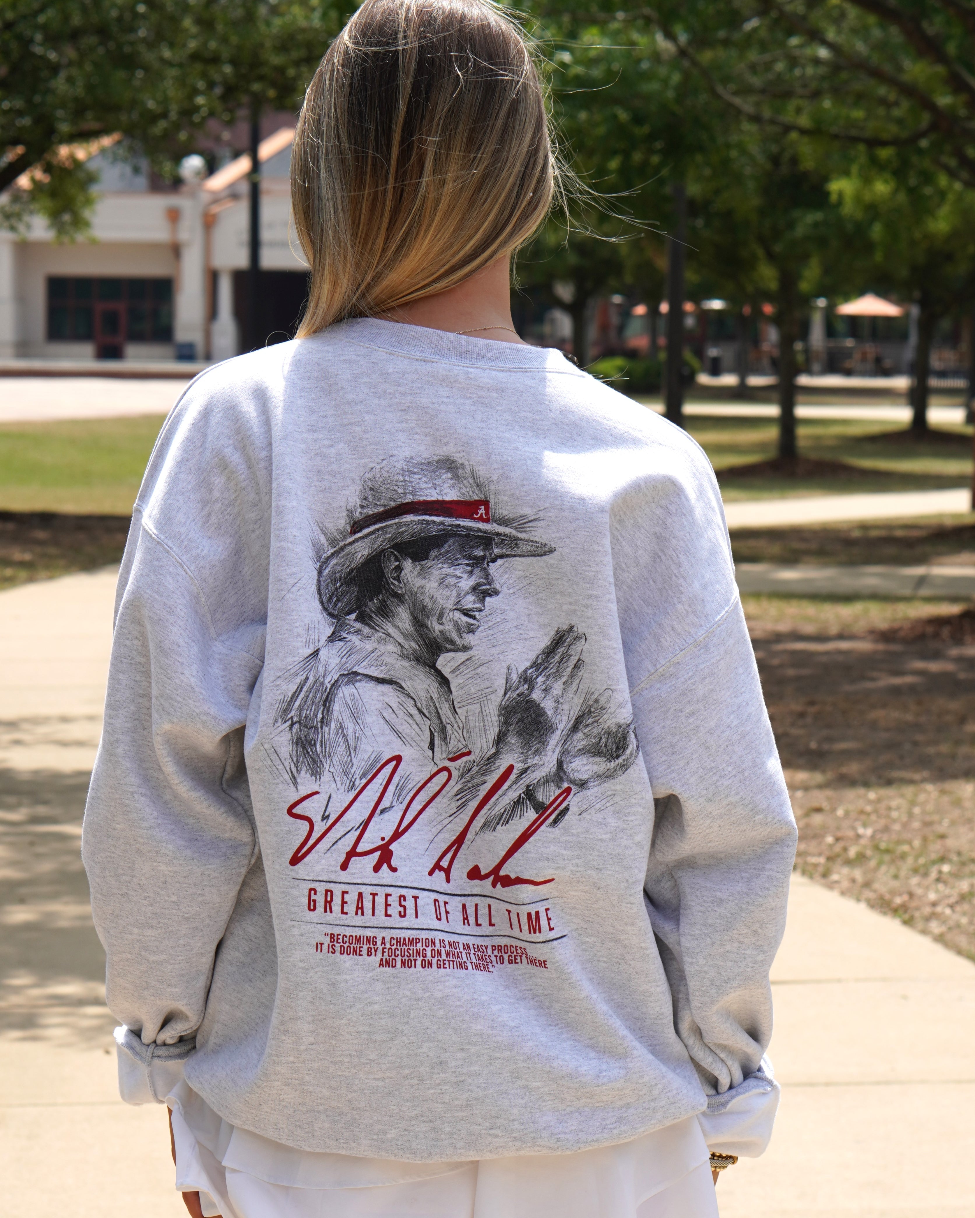 University of Alabama White Gildan Sweatshirt with an illustration of Nick Saban above his signature and Red text "Greatest Of All Time"
