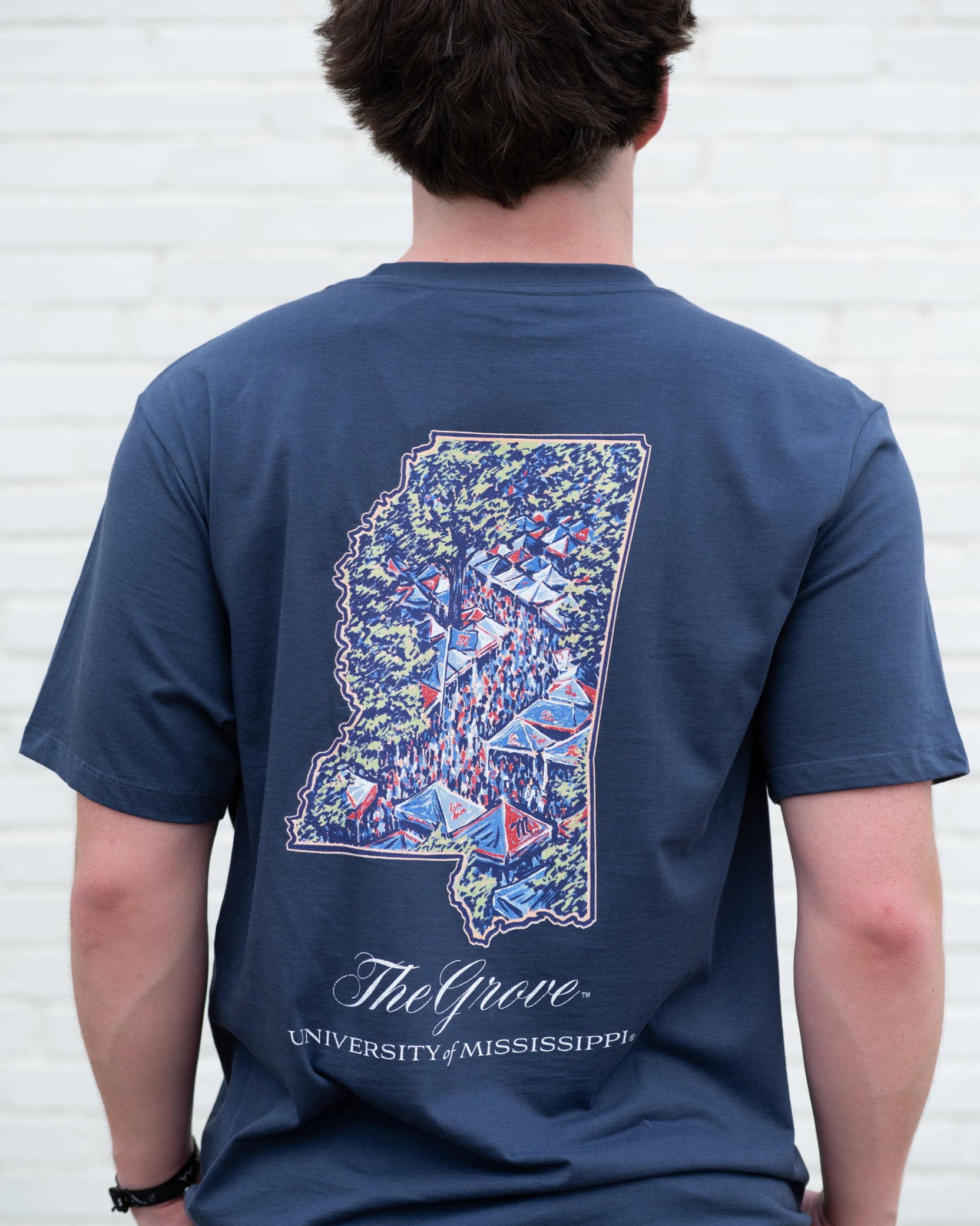 Ole Miss Navy T-Shirt with an outline of Mississippi and an image of The Grove during tailgating inside