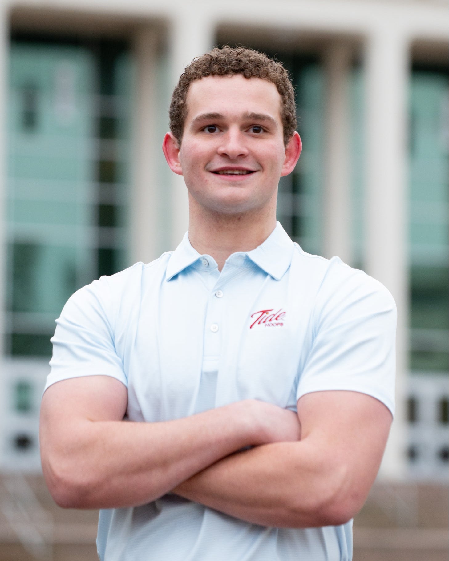 University of Alabama Men’s Light Blue Stripe Polo with the Tide Hoops Logo embroidered on the chest