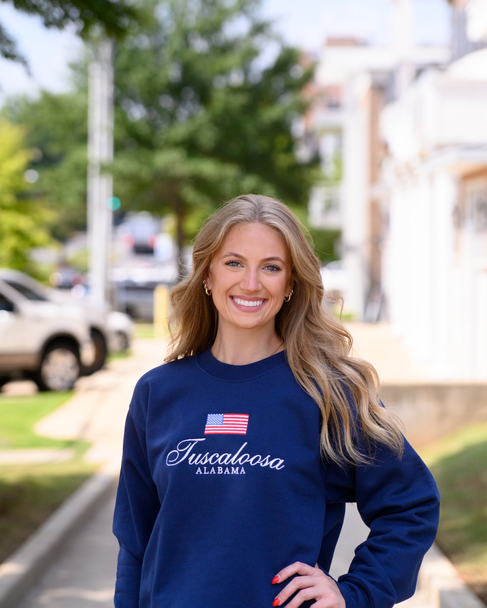 Navy Crewneck with an American Flag above White text “Tuscaloosa Alabama”