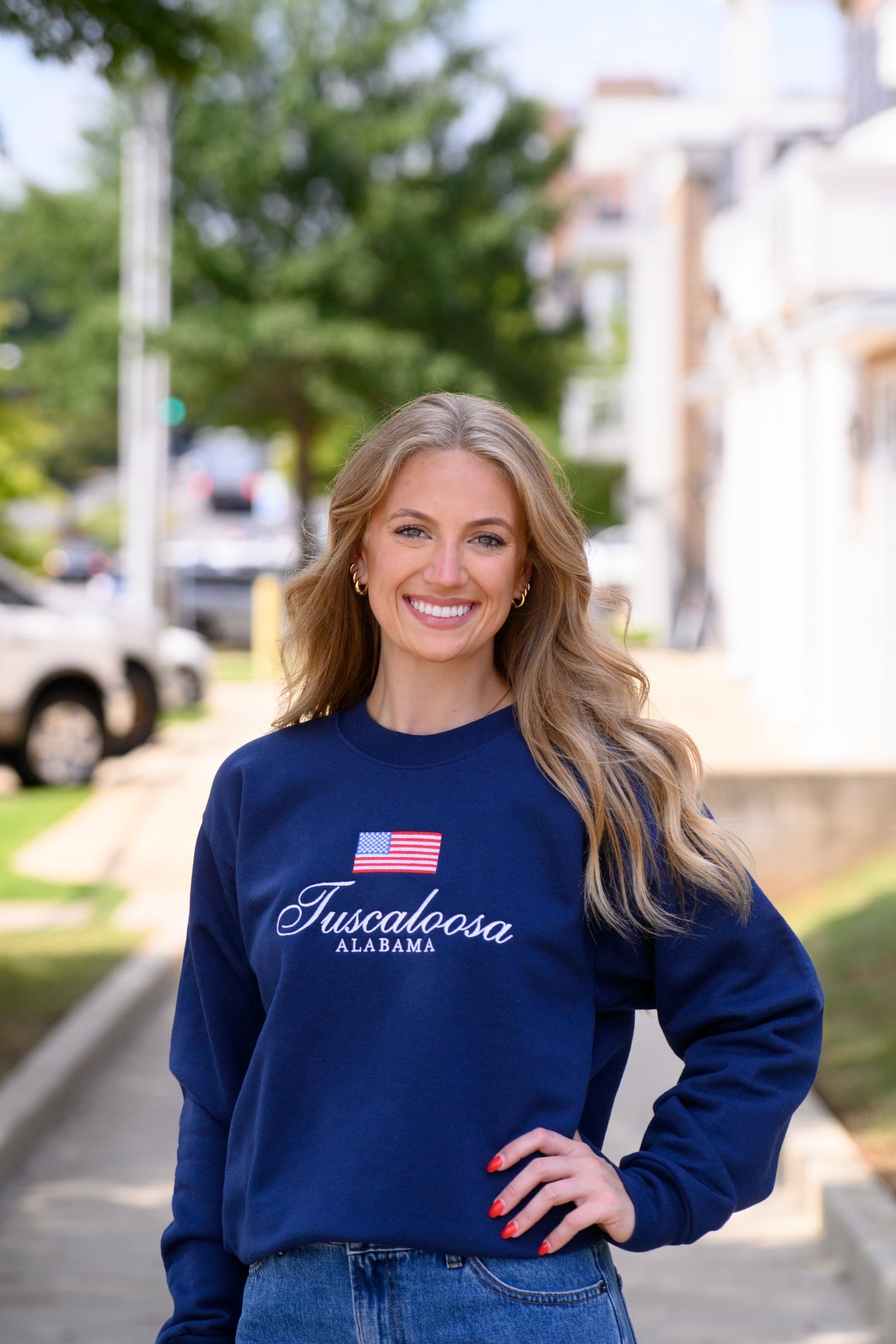 Navy Crewneck with an American Flag above White text “Tuscaloosa Alabama”