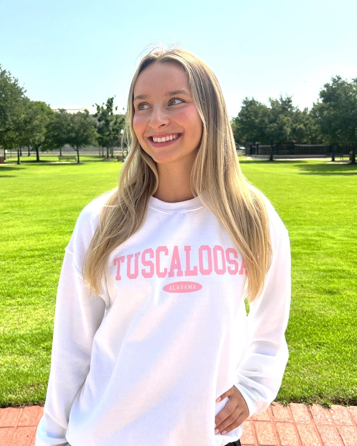 White Tuscaloosa Ladies' Crewneck with Pink text "Tuscaloosa"