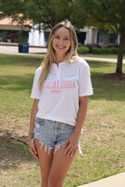 White Tuscaloosa Ladies' Henley with Pink text "Tuscaloosa"