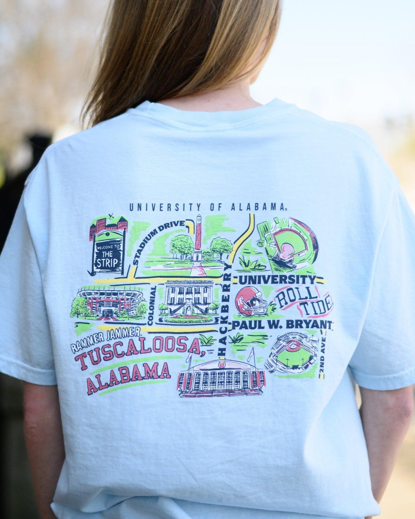 Local Merch Light Blue T-Shirt with a graphic map of The University of Alabama’s landmarks and Red text “Tuscaloosa Alabama”