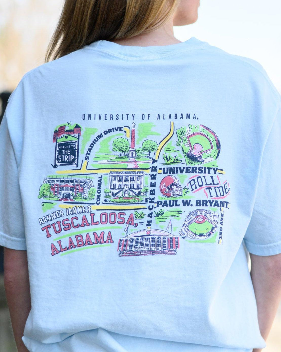 Local Merch Light Blue T-Shirt with a graphic map of The University of Alabama’s landmarks and Red text “Tuscaloosa Alabama”