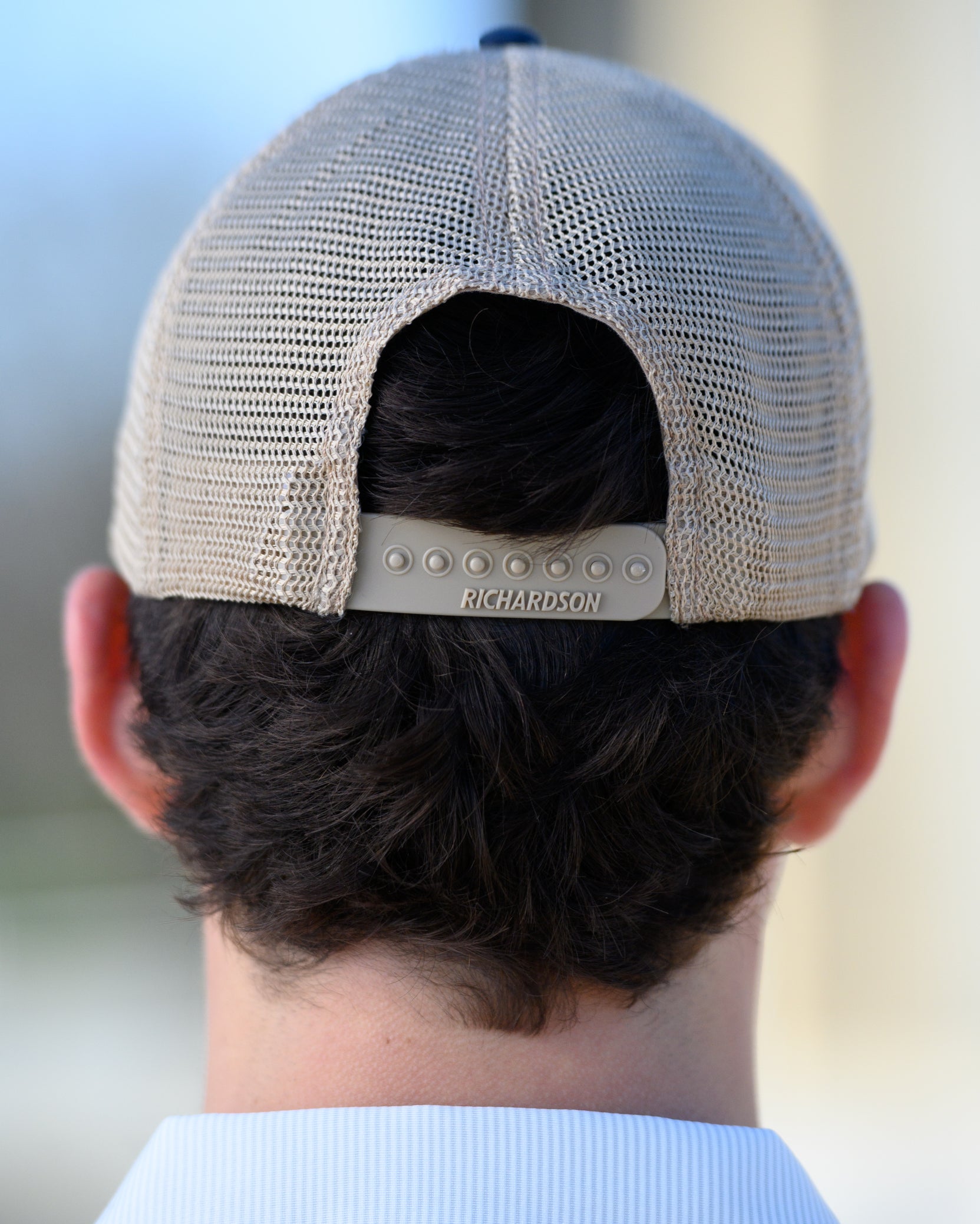 Tuscaloosa Navy and Beige Trucker Hat with a patch featuring Navy text "Tuscaloosa Alabama" a drawing of the sun setting on the iconic Tuscaloosa Railroad Tracks.
Snapback Trucker