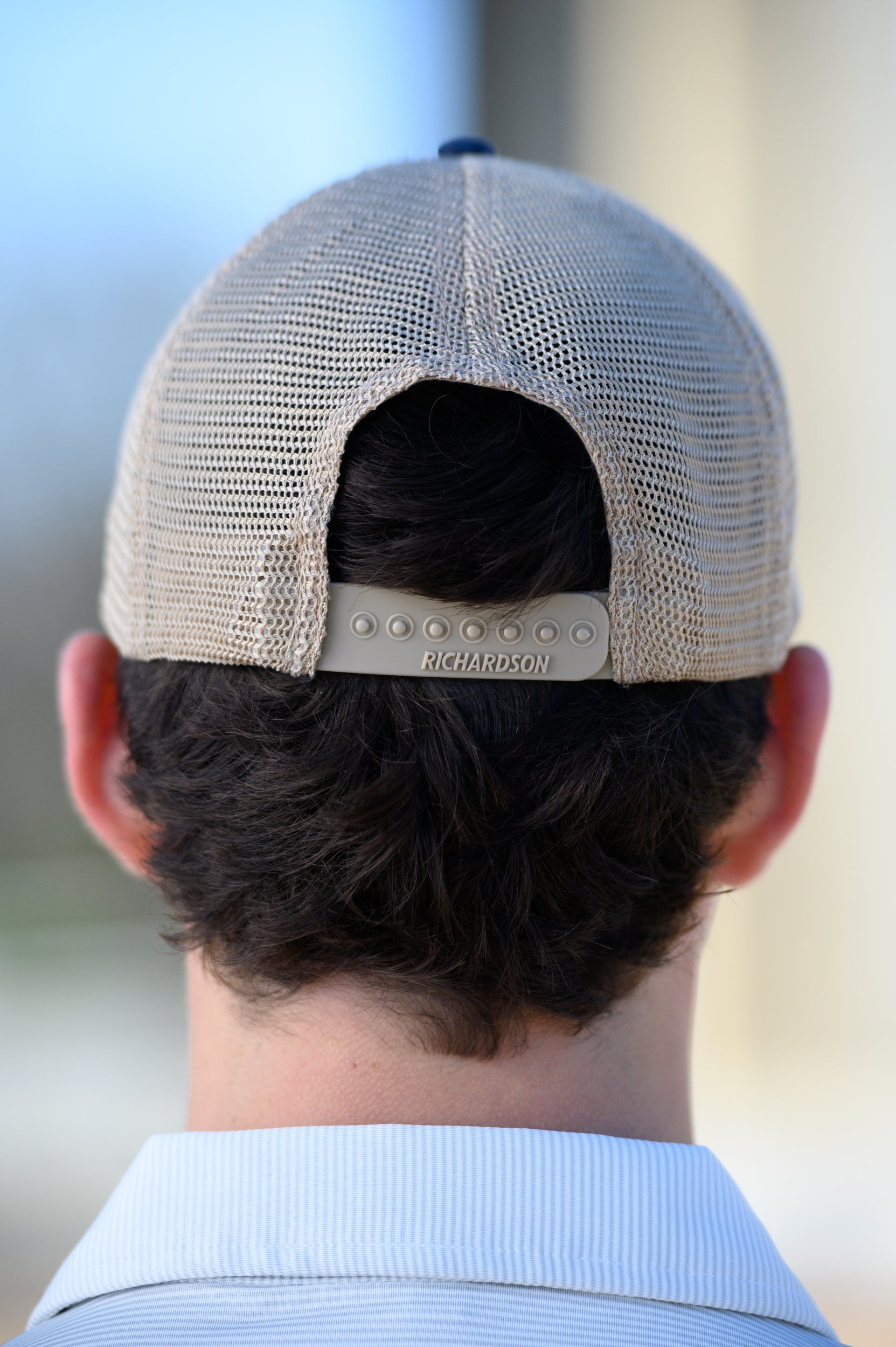 Tuscaloosa Navy and Beige Trucker Hat with a patch featuring Navy text "Tuscaloosa Alabama" a drawing of the sun setting on the iconic Tuscaloosa Railroad Tracks.
Snapback Trucker
