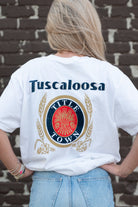 Tuscaloosa White T-Shirt with Navy text "Tuscaloosa" above the Title Town emblem
