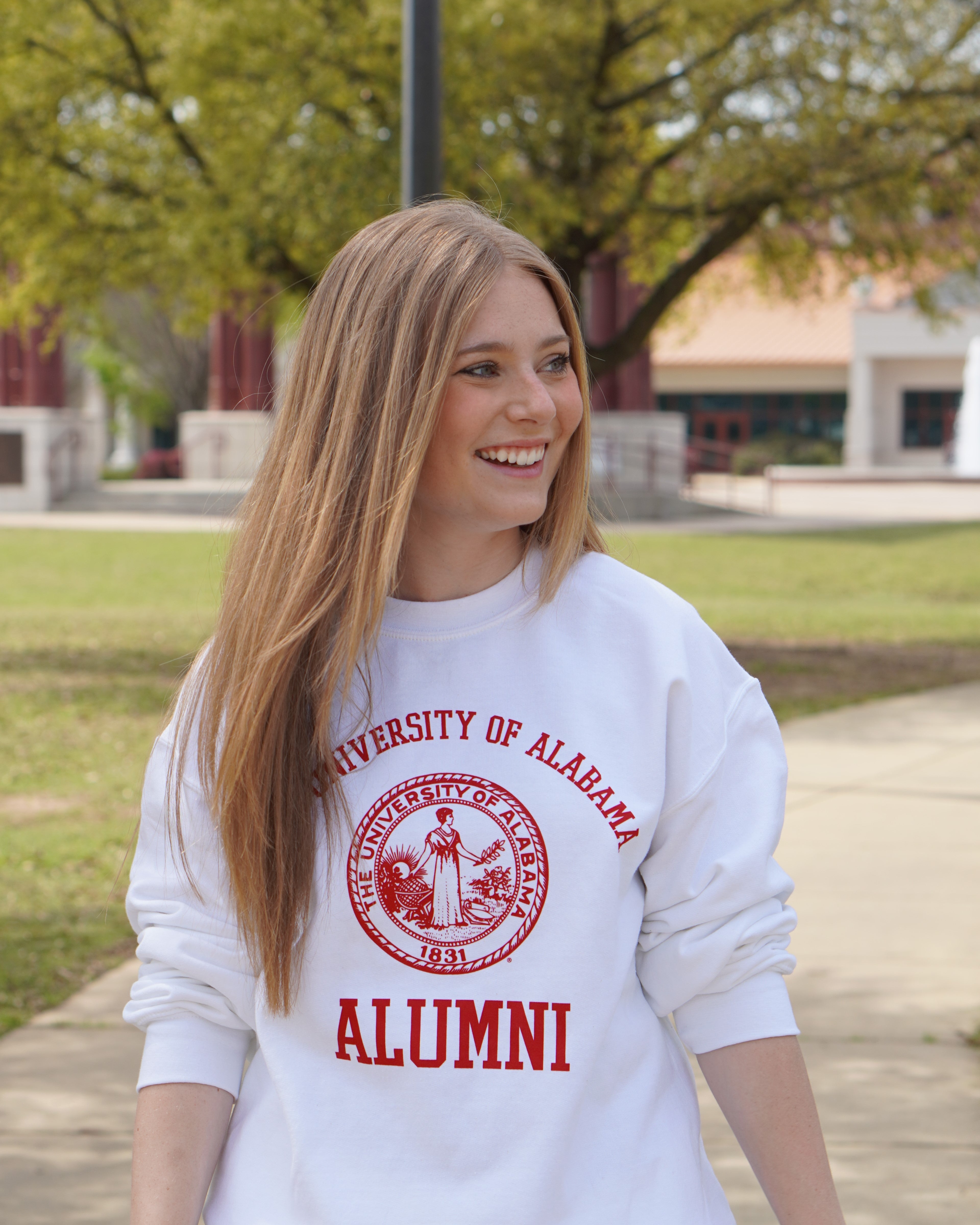University of Alabama Light Grey Alumni Sweatshirt with Red text "University of Alabama" above the Red Alumni Seal and Red text "Alumni" below